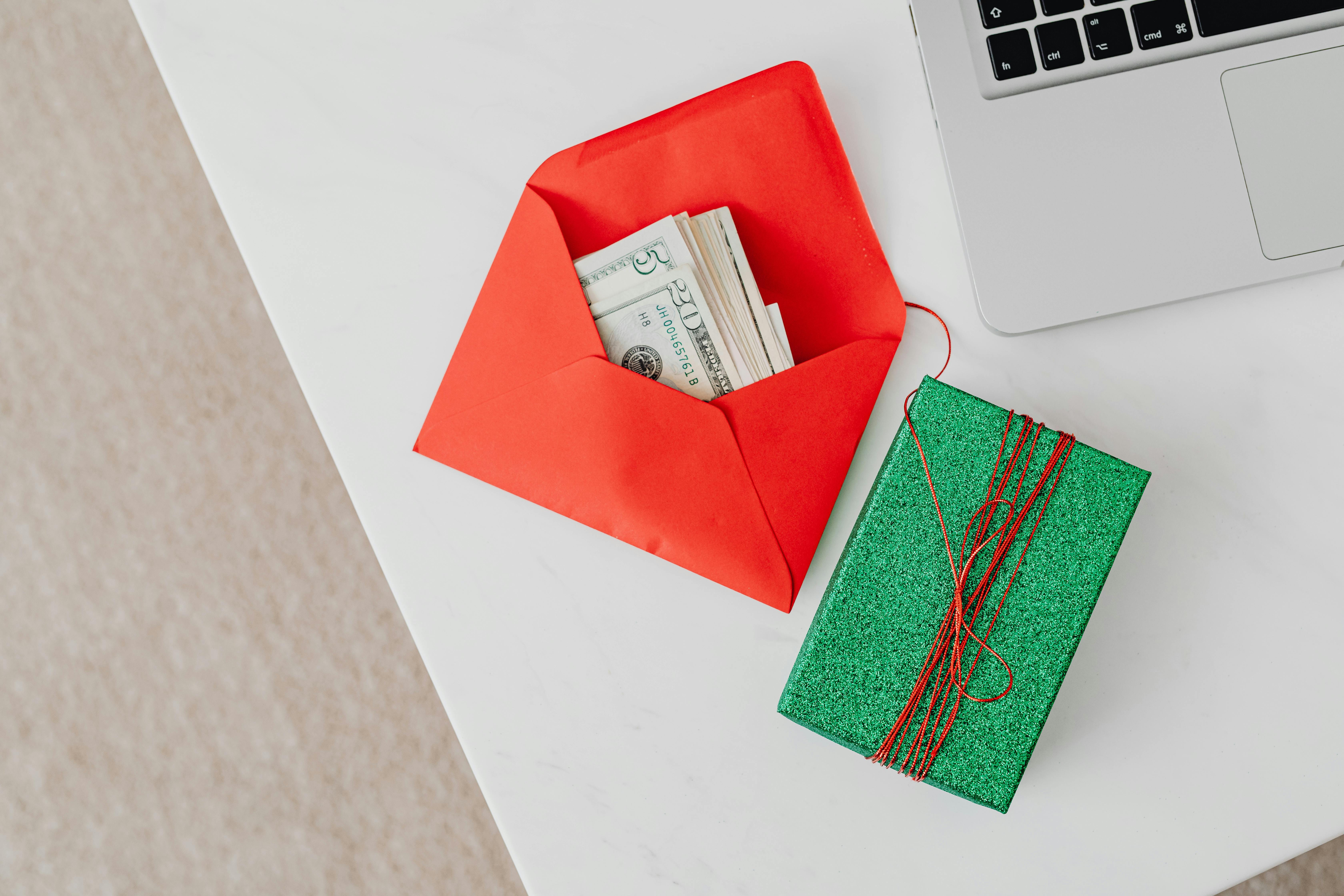 Money in an envelope near a box | Source: Pexels