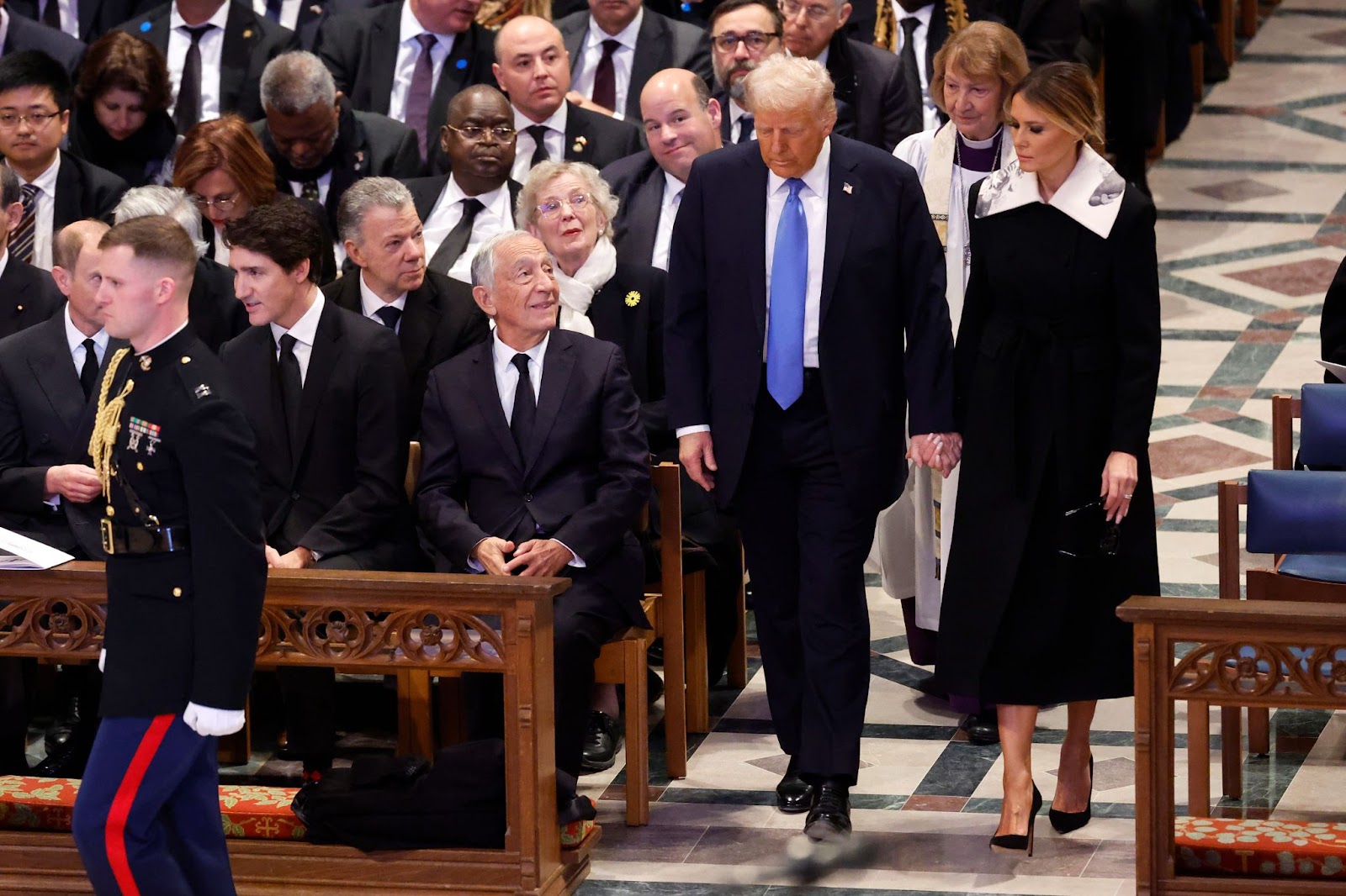 Le président élu des États-Unis Donald Trump et Melania Trump arrivent pour les funérailles nationales de l'ancien président américain Jimmy Carter à la cathédrale nationale de Washington, le 9 janvier 2025, à Washington, D.C. | Source : Getty Images