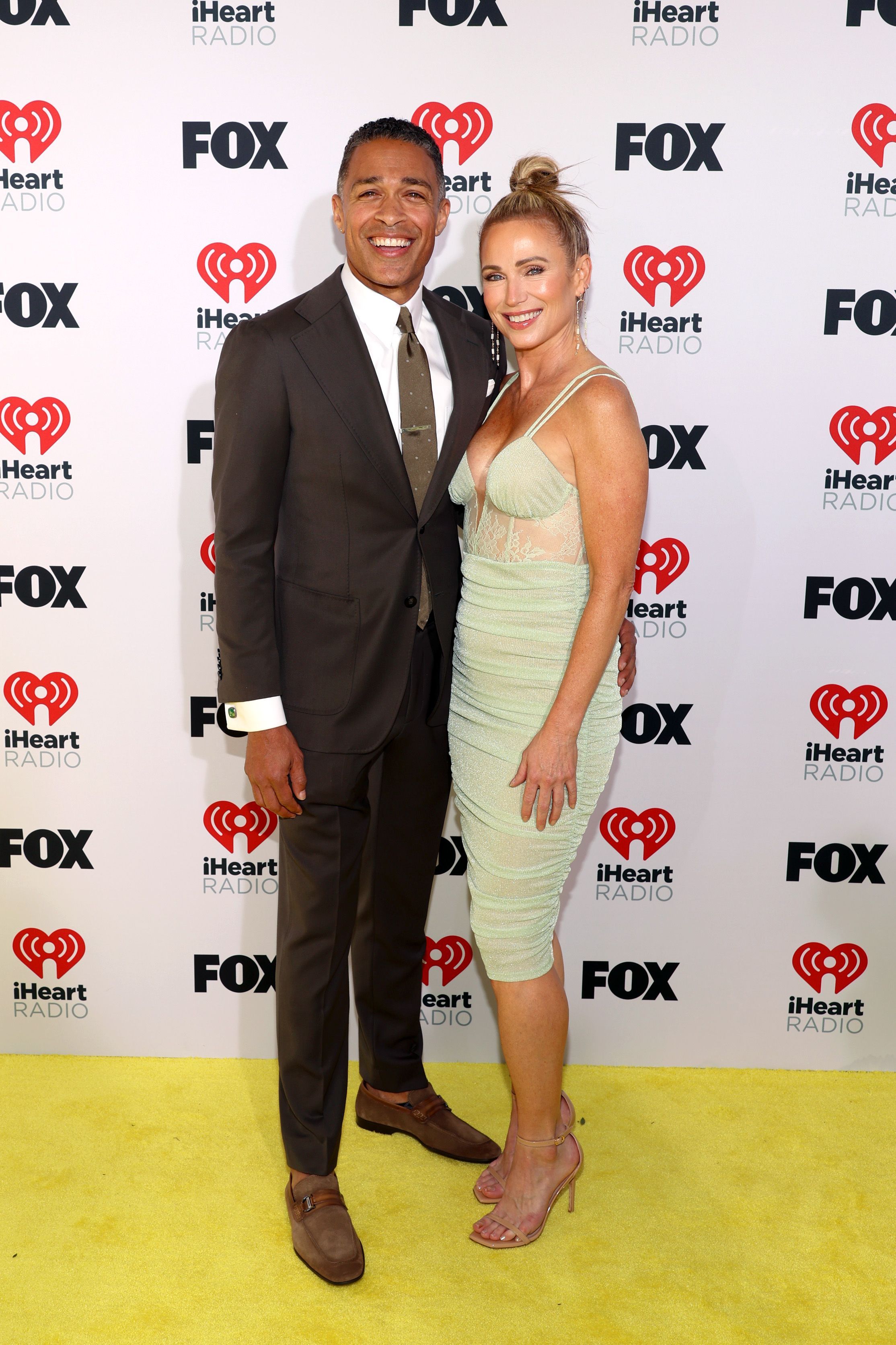 T.J. Holmes et Amy Robach lors des iHeart Radio Music Awards 2024, le 1er avril 2024 | Source : Getty Images