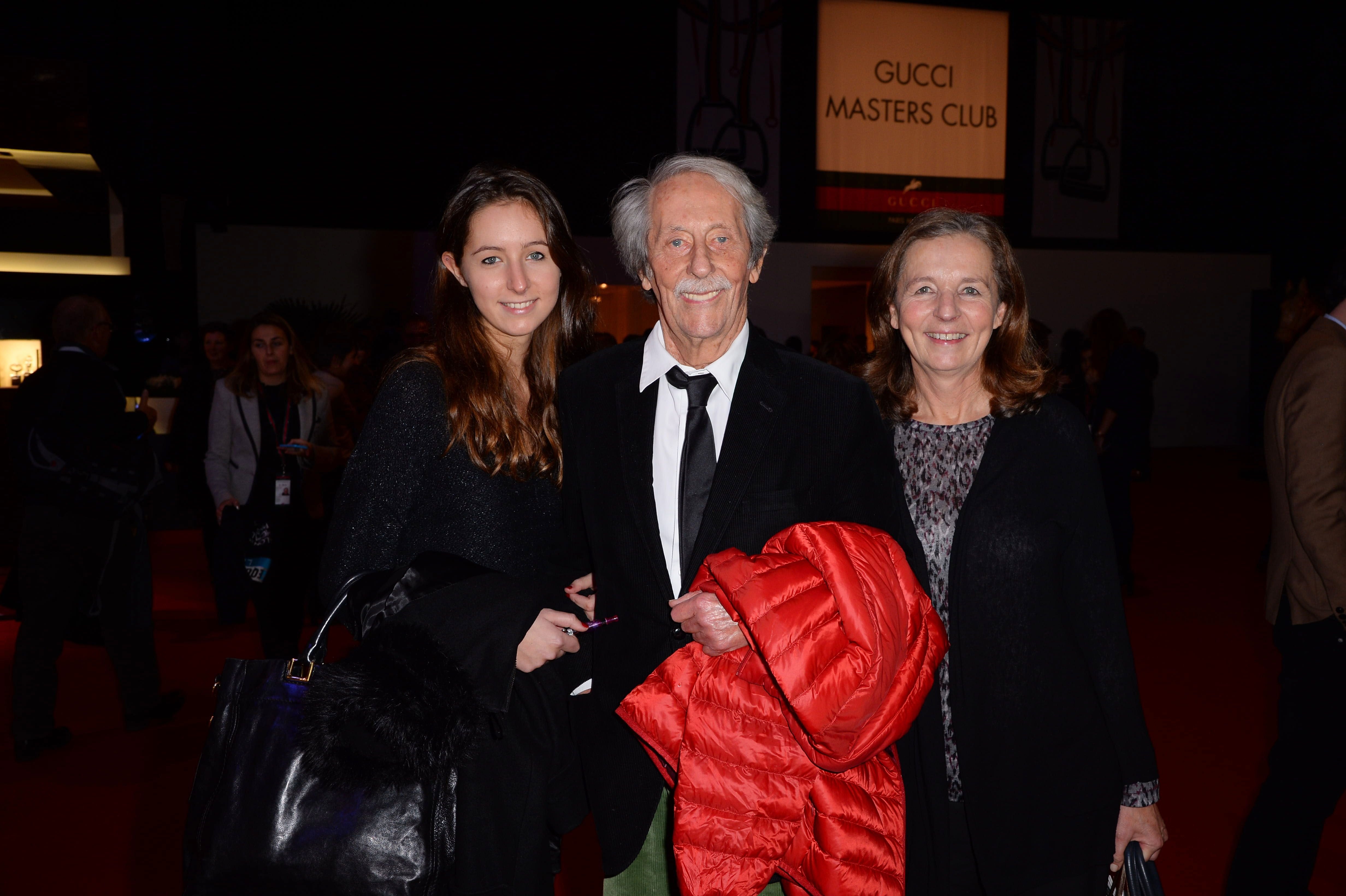 Jean Rochefort, son épouse Delphine Gleize et leur fille Clémence Rochefort, 2013, à Paris.  | Photo : Getty Images