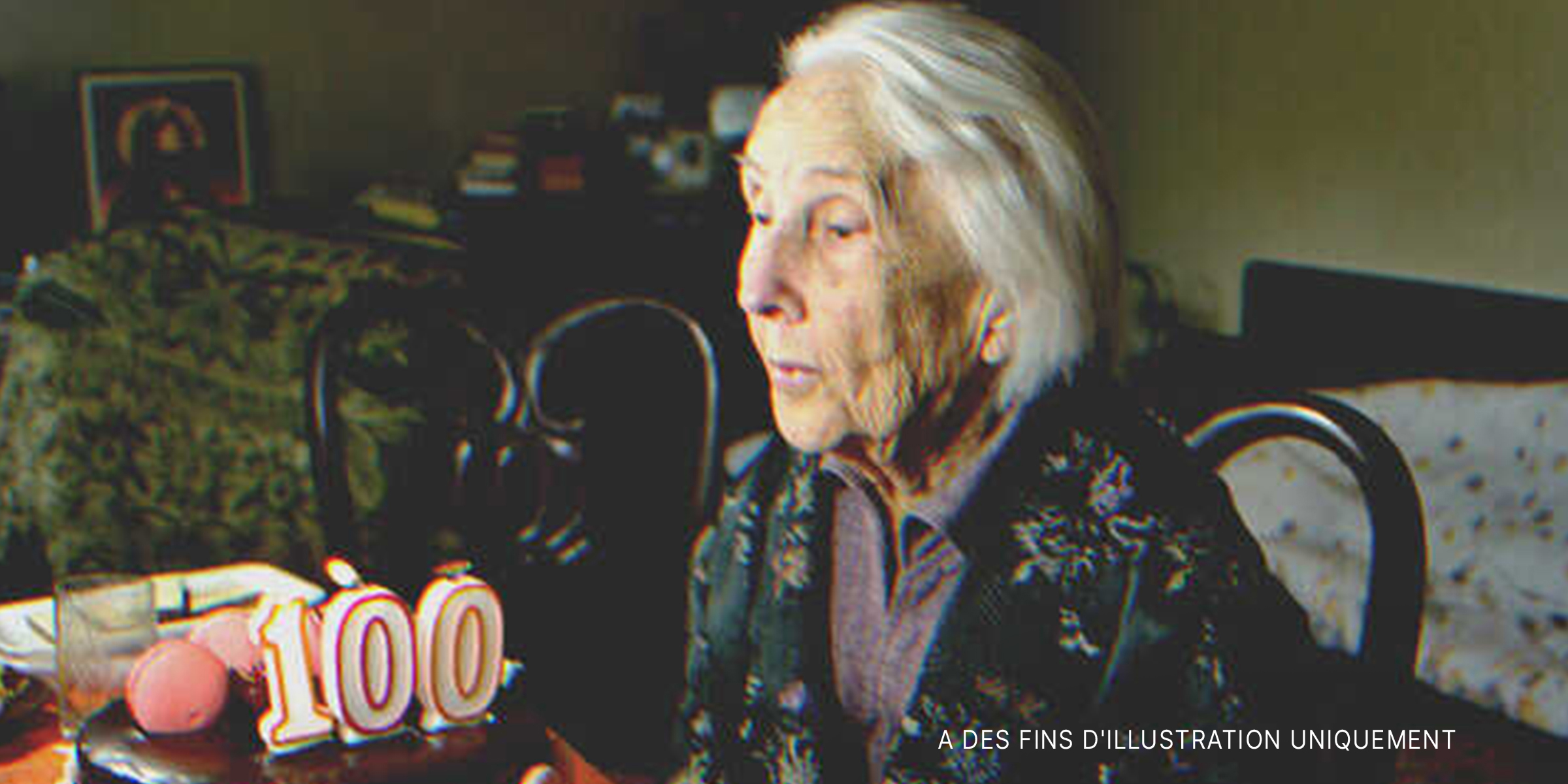 Une vieille femme célébrant son 100e anniversaire | Source : Shutterstock