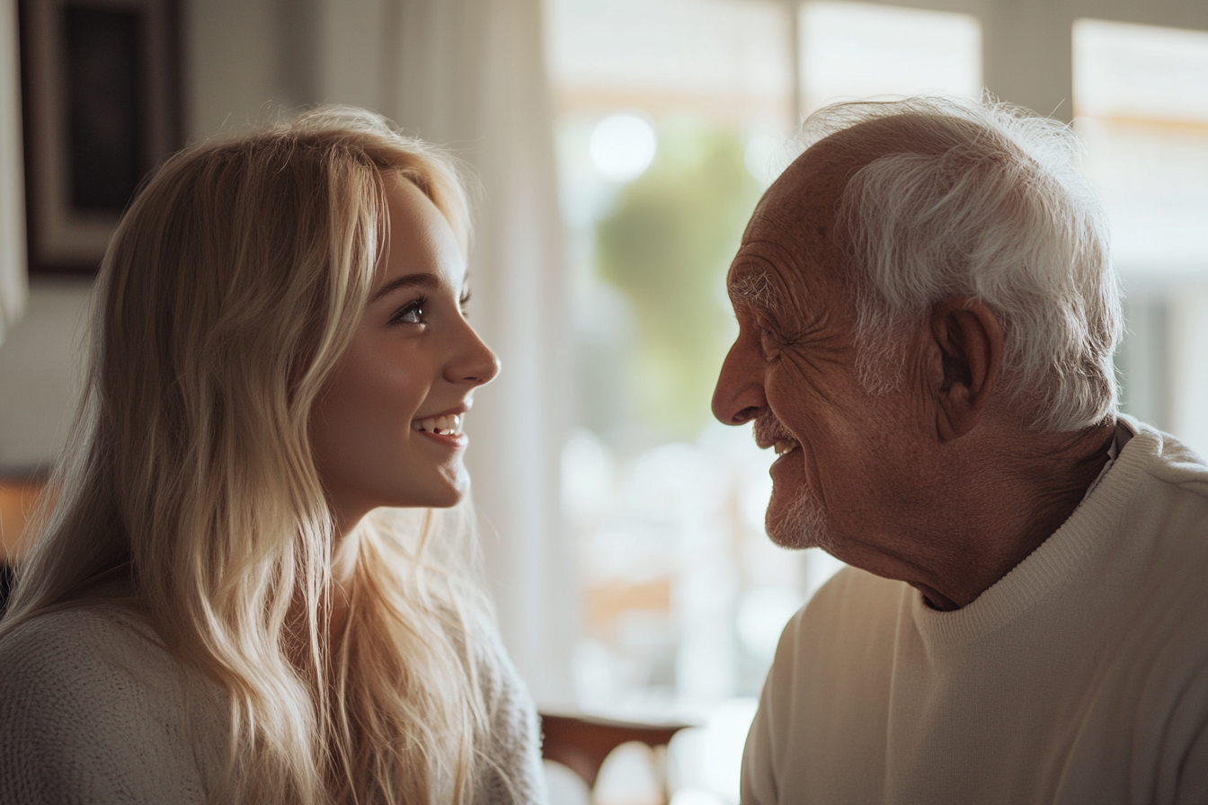 Une jeune femme s'adressant à son grand-père | Source : Midjourney