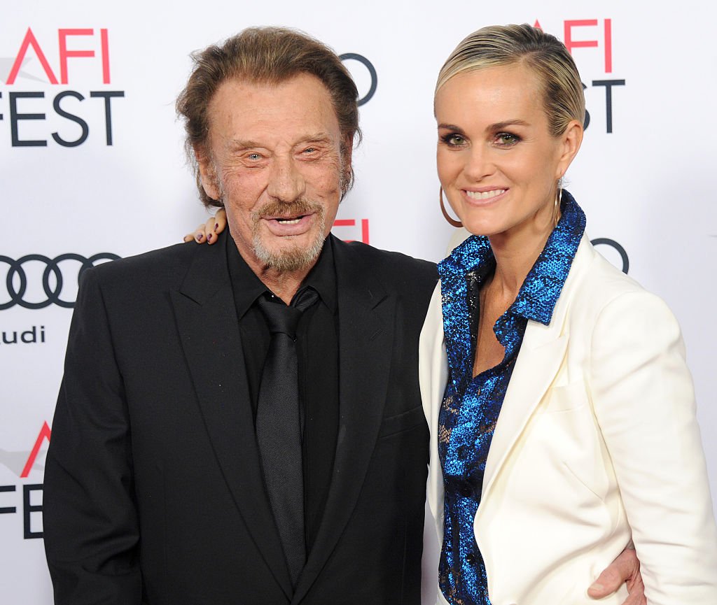 Le chanteur Johnny Hallyday et l'actrice/épouse Laeticia Hallyday arrivent à l'AFI FEST 2016 Presented By Audi - Opening Night - Premiere Of 20th Century Fox's "Rules Don't Apply" au TCL Chinese Theatre le 10 novembre 2016 à Hollywood, Californie. | Photo : Getty Images