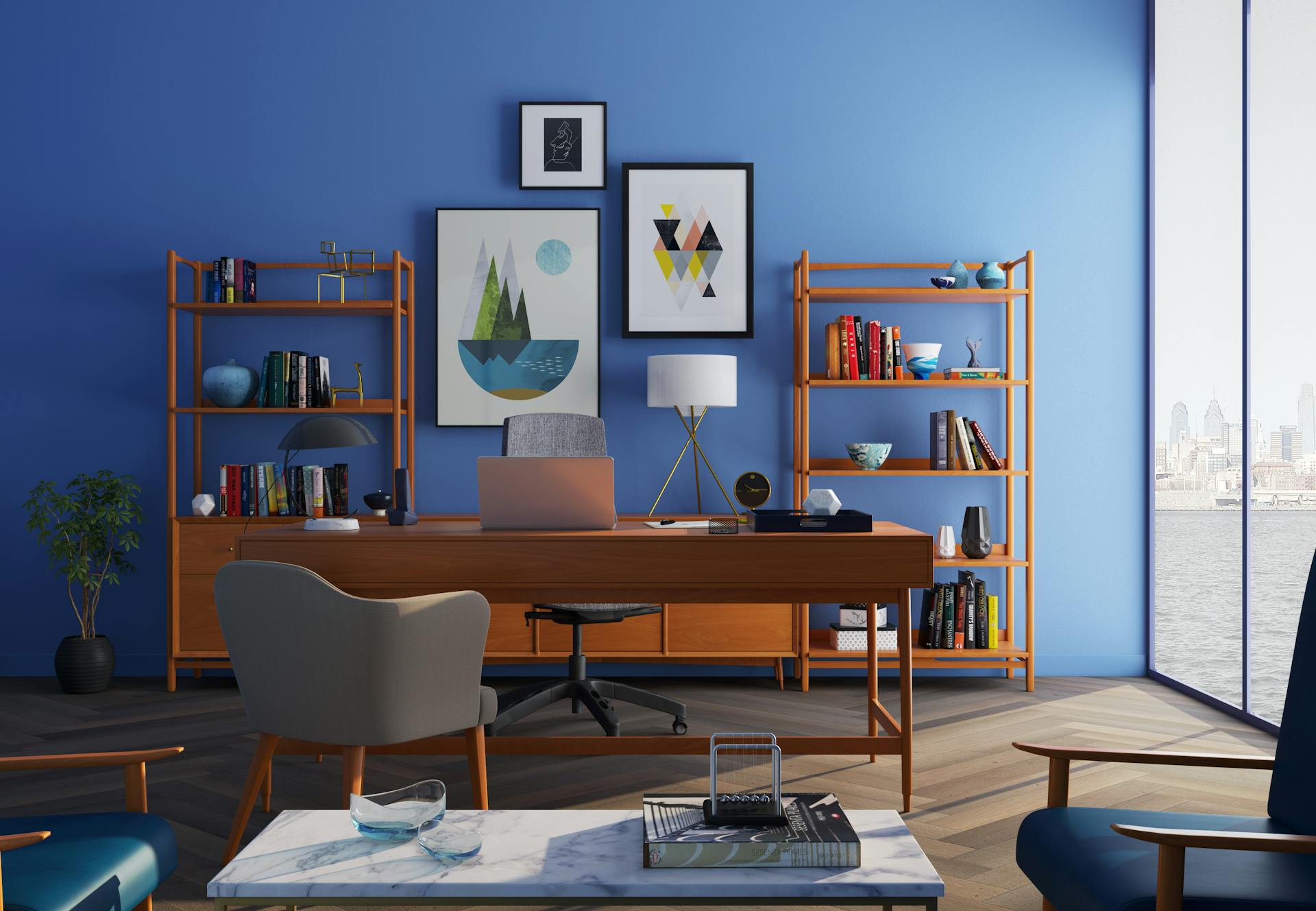 Un bureau chic avec un mur bleu | Source : Pexels