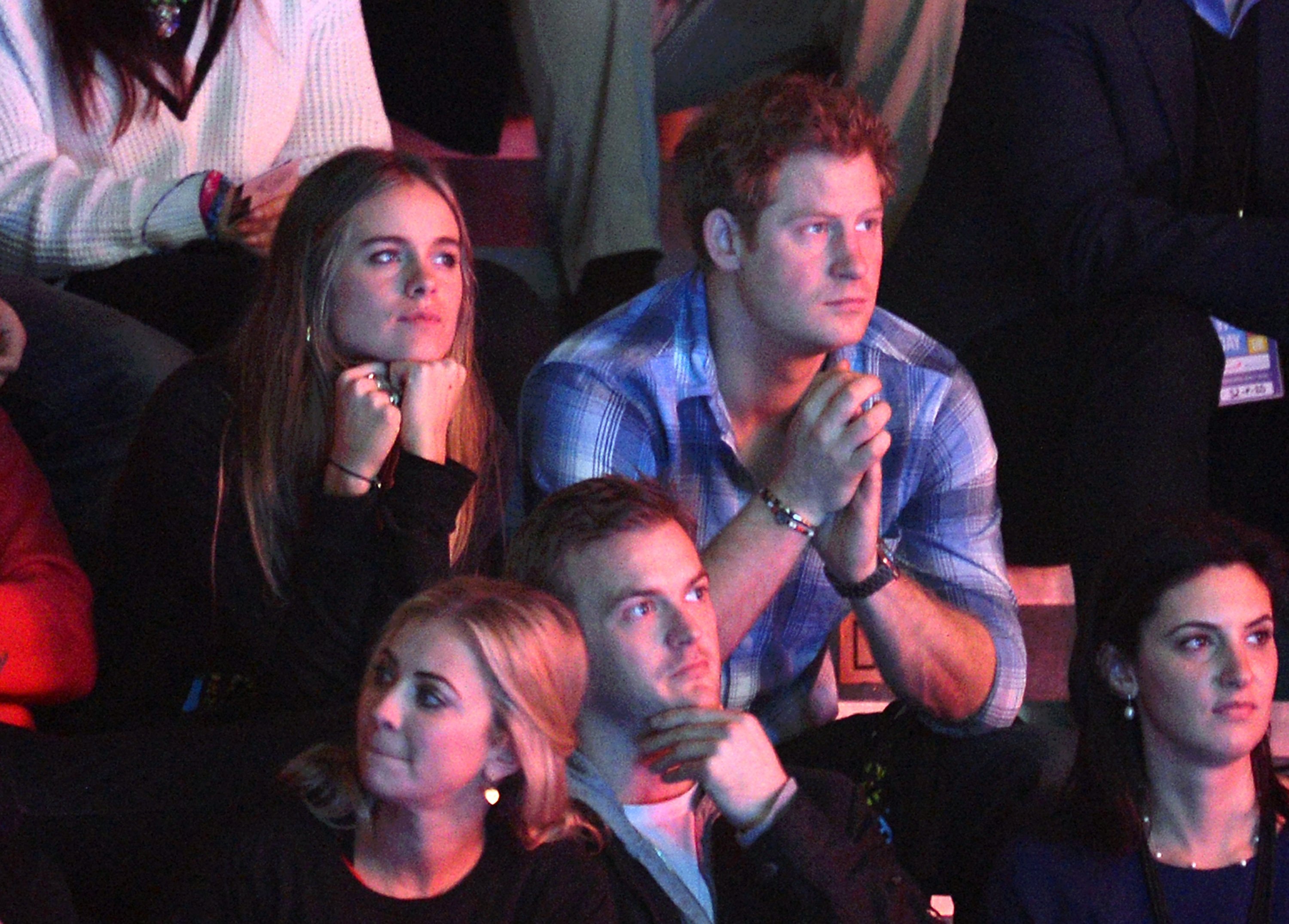 Cressida Bonas et le prince Harry à la Wembley Arena le 7 mars 2014 | Source : Getty Images