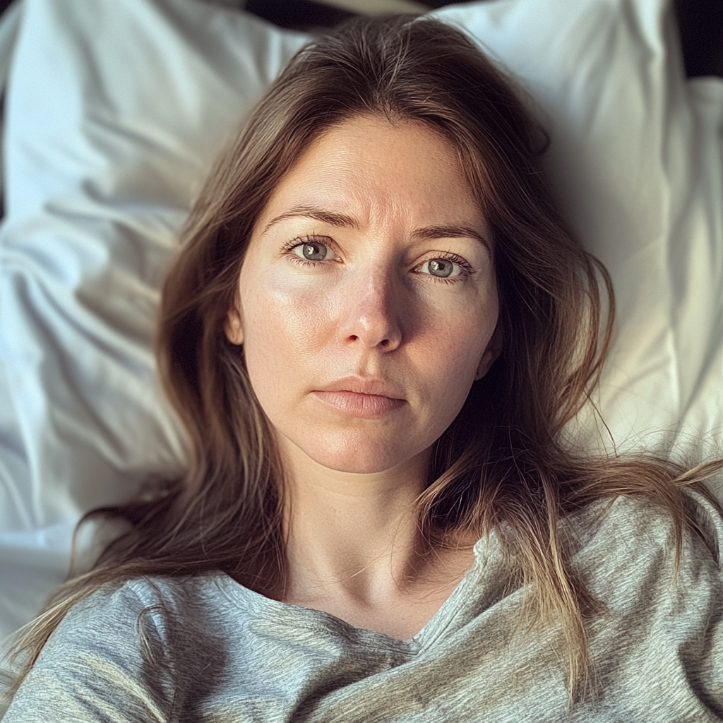 A woman lying in a hospital bed | Source: Midjourney