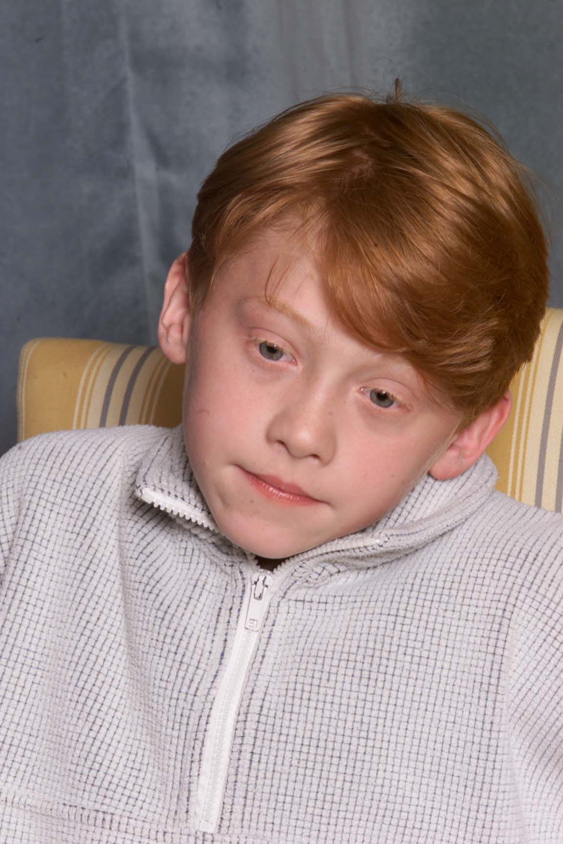 Rupert Grint lors d'une conférence de presse pour "Harry Potter et l'école des sorciers" à Londres le 23 août 2000 | Source : Getty Images