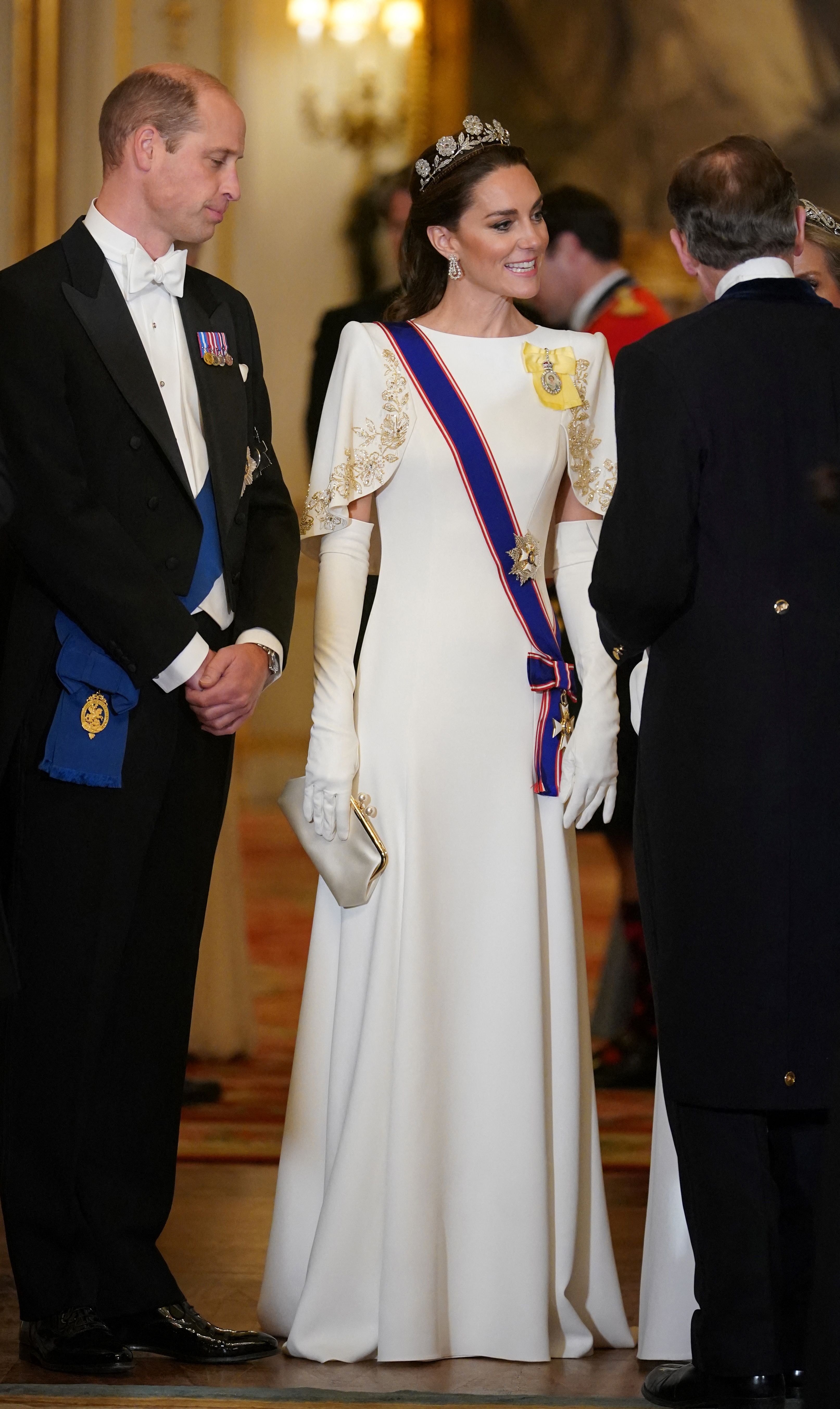 Le prince William, prince de Galles, et Catherine, princesse de Galles, arrivent pour un banquet d'État au palais de Buckingham, dans le centre de Londres, le 21 novembre 2023, pour le président sud-coréen Yoon Suk Yeol et son épouse Kim Keon Hee, au premier jour d'une visite d'État de trois jours au Royaume-Uni. | Source : Getty Images