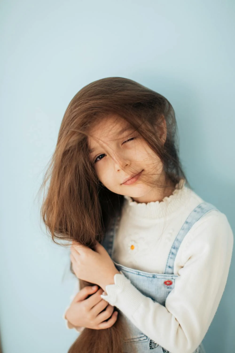 Une petite fille souriante | Source : Pexels