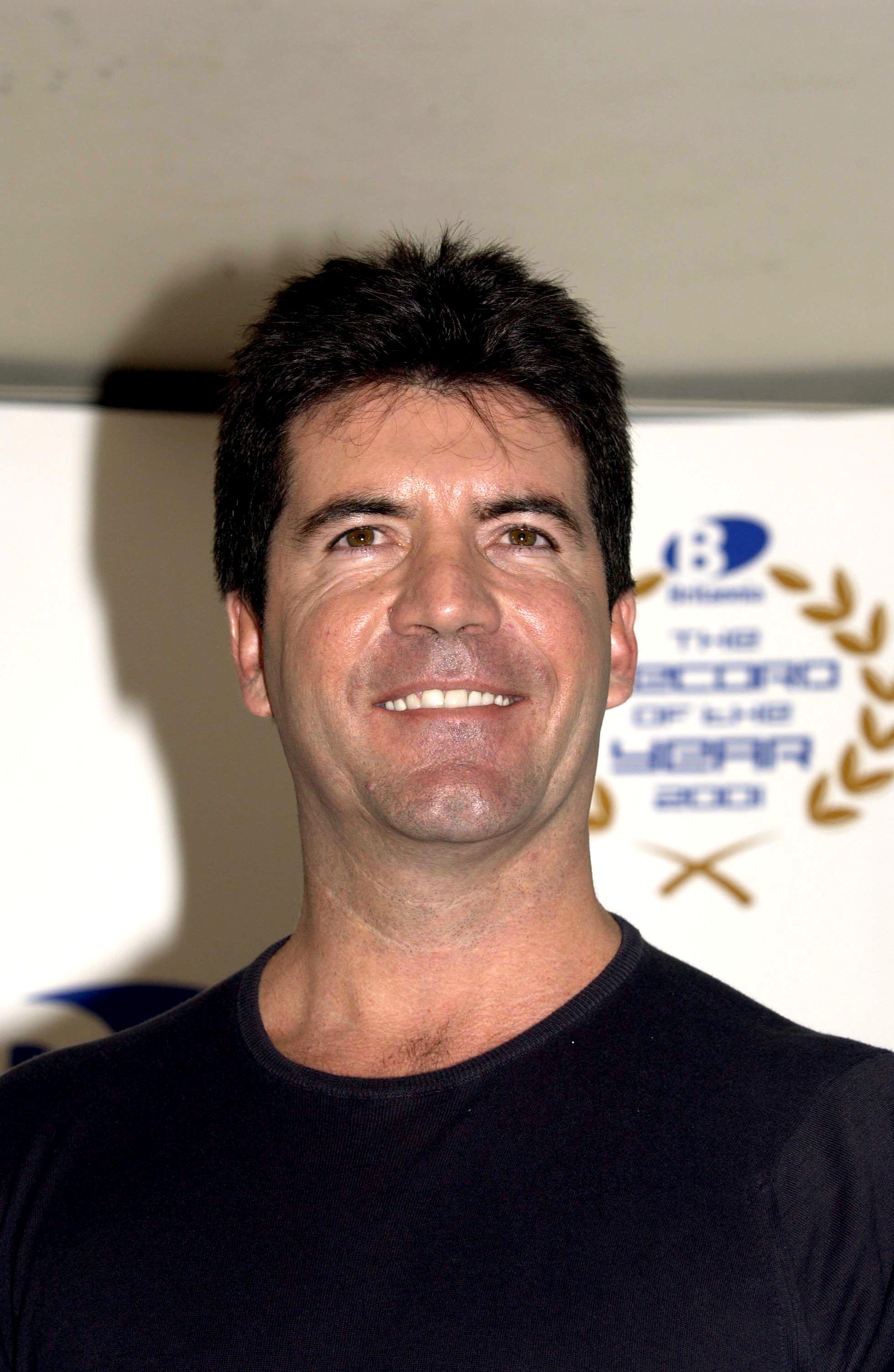 Simon Cowell au Hard Rock Cafe le 22 novembre 2001 | Source : Getty Images