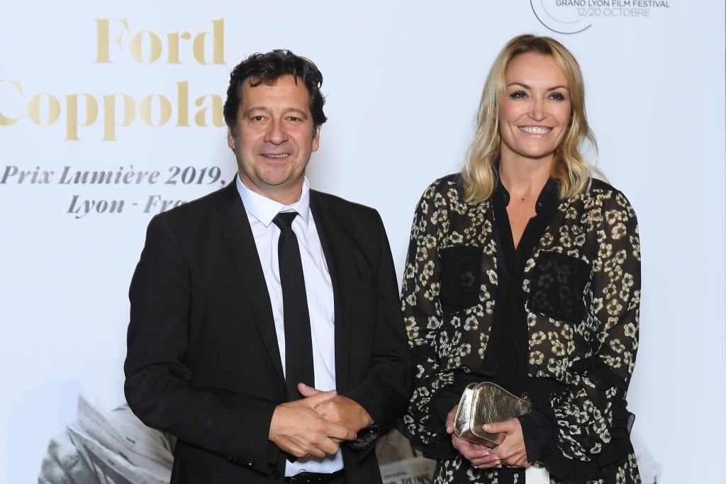 Laurent Gerra et Christelle Bardet assistent à l'hommage à Francis Ford Coppola lors du 11ème Festival du Film Lumière le 18 octobre 2019 à Lyon, France. | Photo : Getty Images.