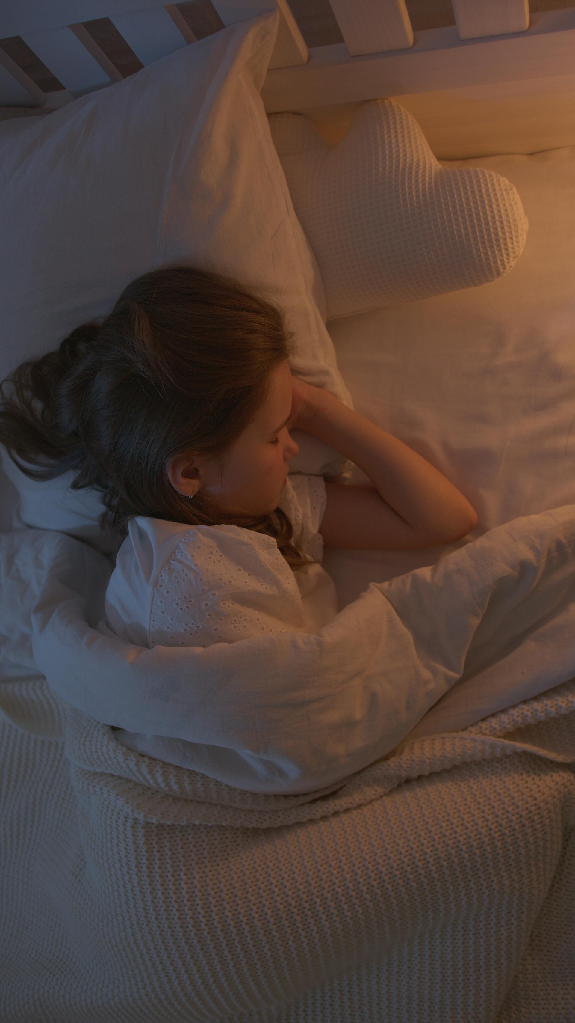 Une fille qui sanglote dans son lit | Source : Pexels