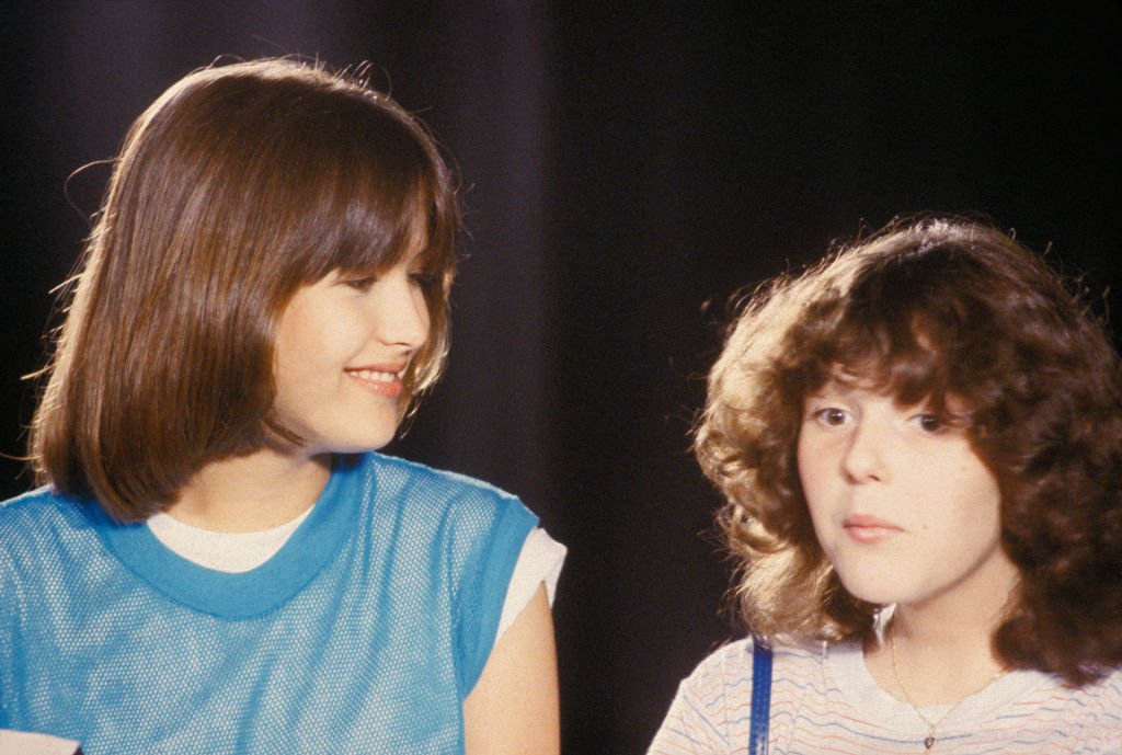 Sophie Marceau et Sheila O'Connor tournent 'La Boum II' en juillet 1982, France. | Photo : Getty Images