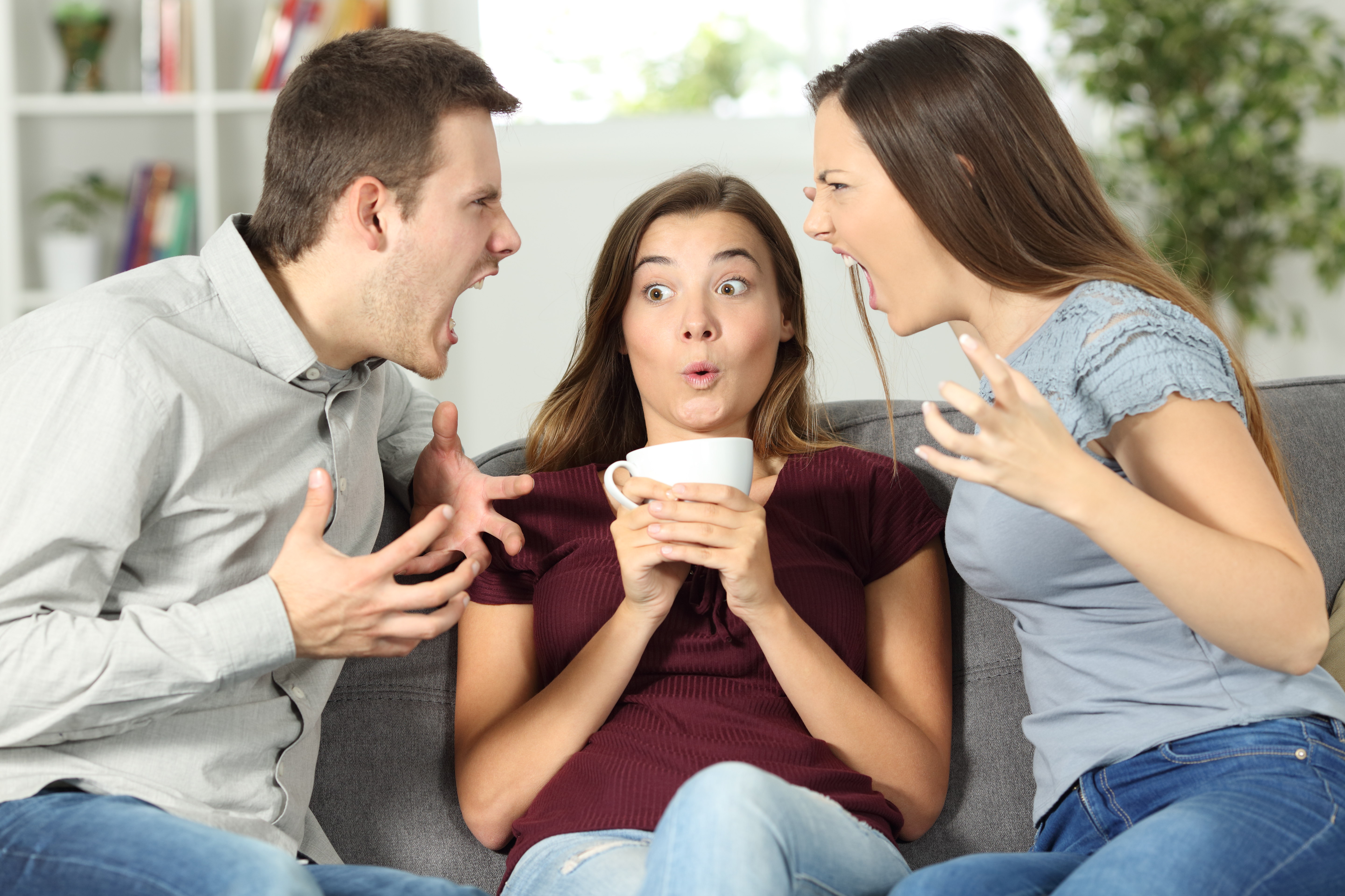 Un couple et une maîtresse pris dans une dispute | Source : Getty Images