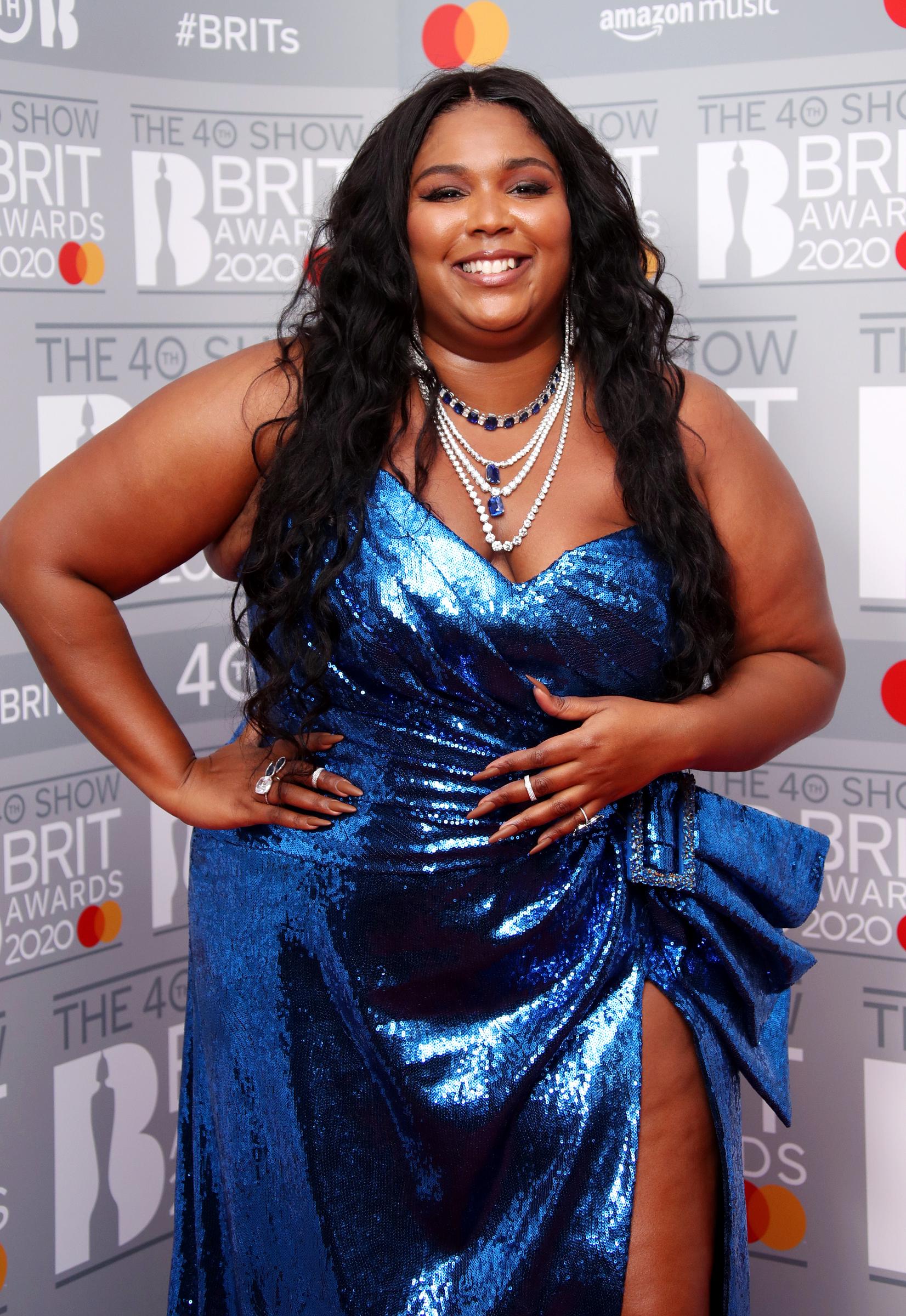 Lizzo pose dans les salles des gagnants lors des BRIT Awards 2020 à l'O2 Arena le 18 février 2020, à Londres, Angleterre | Source : Getty Images