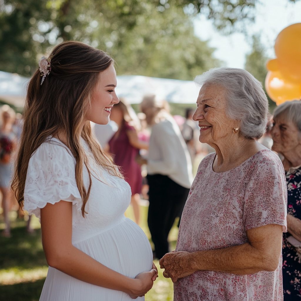 Femme enceinte saluant une femme plus âgée lors d'une fête en plein air | Source : Midjourney