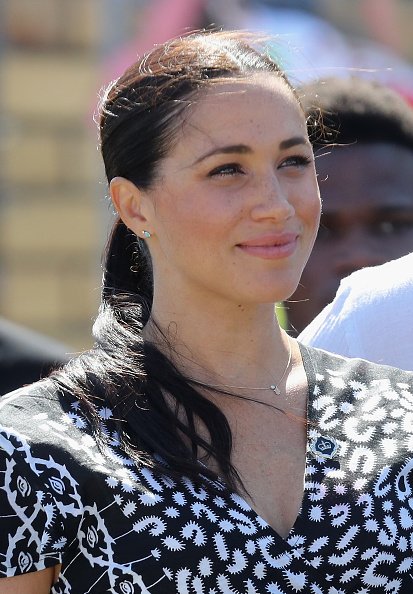 Meghan, duchesse de Sussex, visite une initiative du bureau de la justice dans la banlieue de Nyanga, Afrique du Sud | Photo: Getty Images