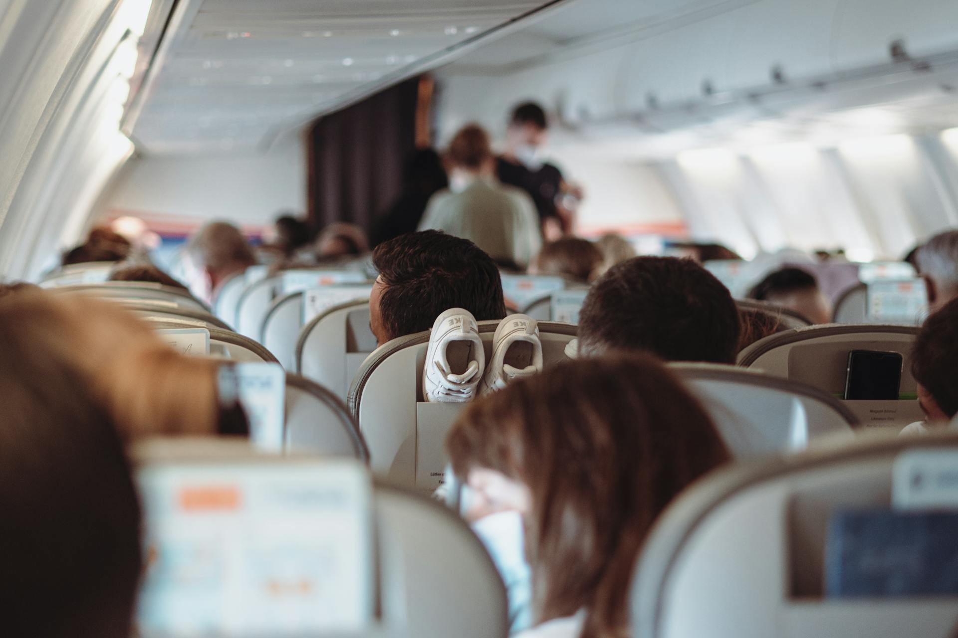 Des gens dans un avion | Source : Pexels