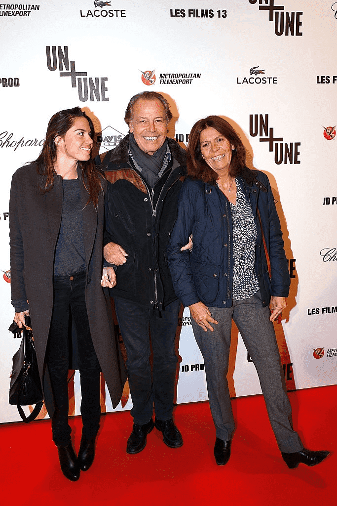 Michel Leeb, son épouse Béatrice et sa fille Elsa assistent à la première parisienne de "Un + Une" | Source : Getty Images