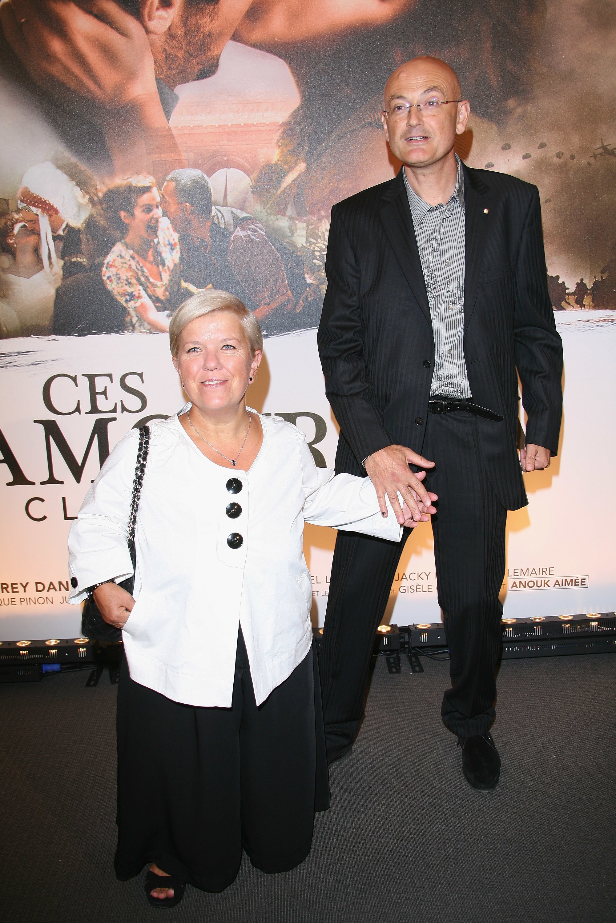 Mimie Mathy et son mari au Cinéma UGC Normandie le 12 septembre 2010 à Paris, France. | Photo : Getty Images