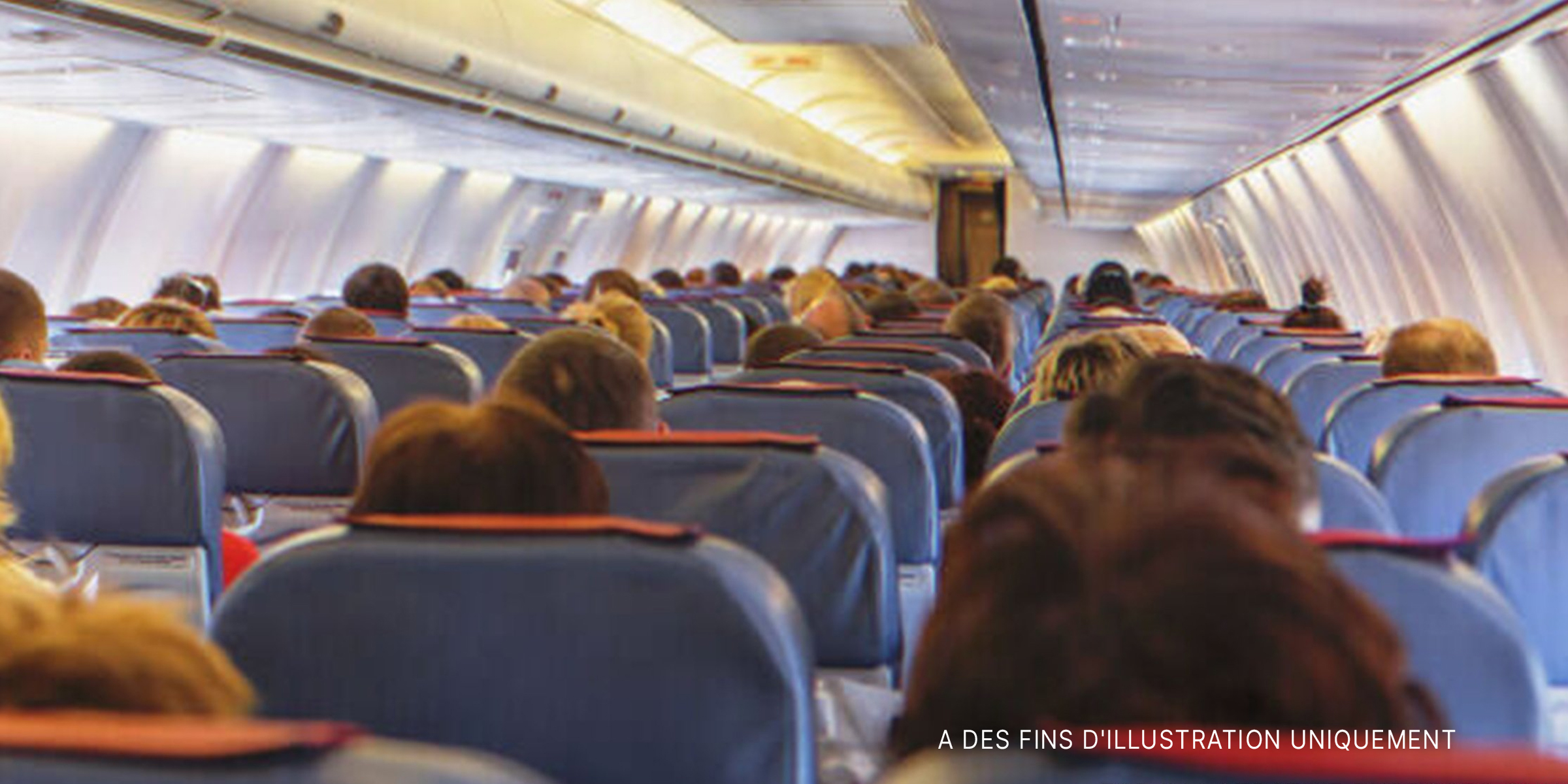 Passagers dans un avion | Source : Getty Images