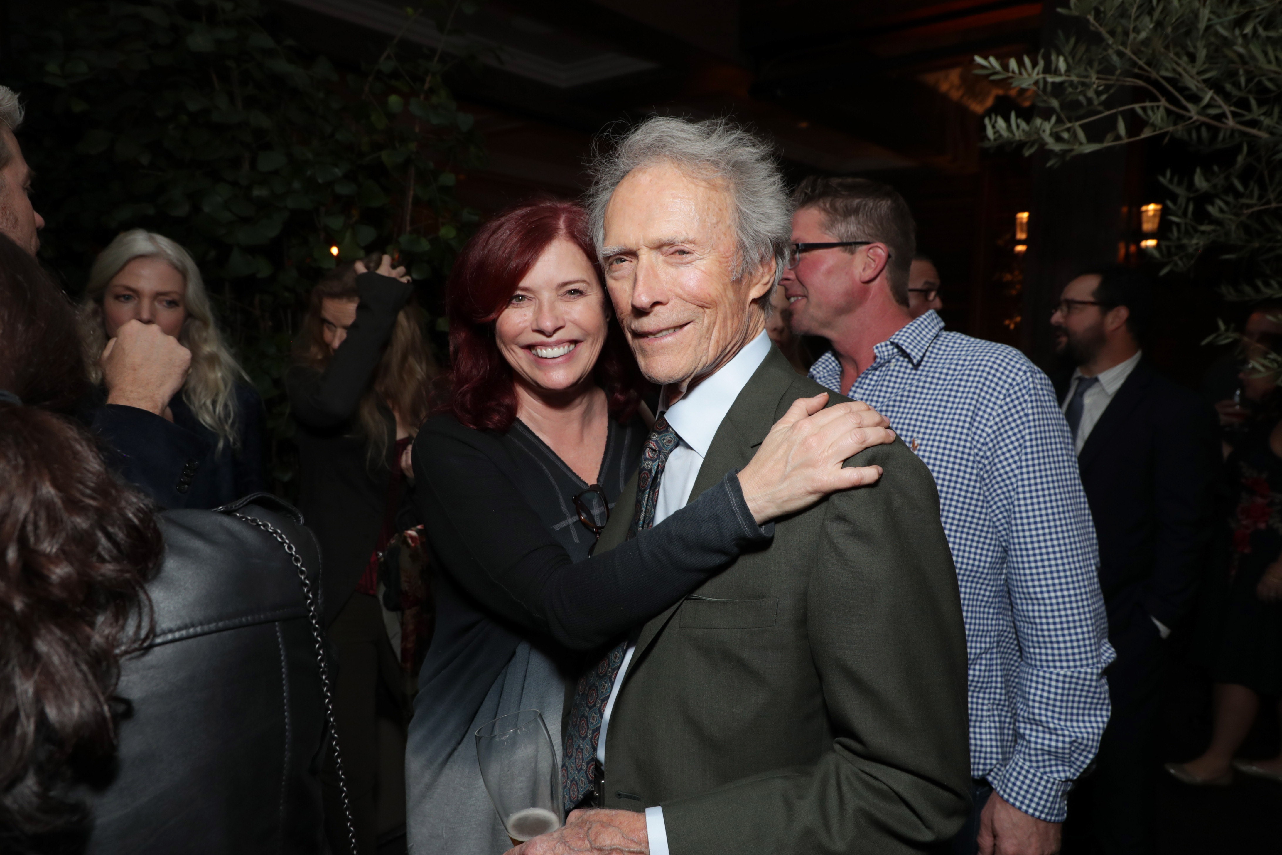 Kimber et Clint Eastwood lors de la première mondiale de "The Mule" le 10 décembre 2018. | Source : Getty Images