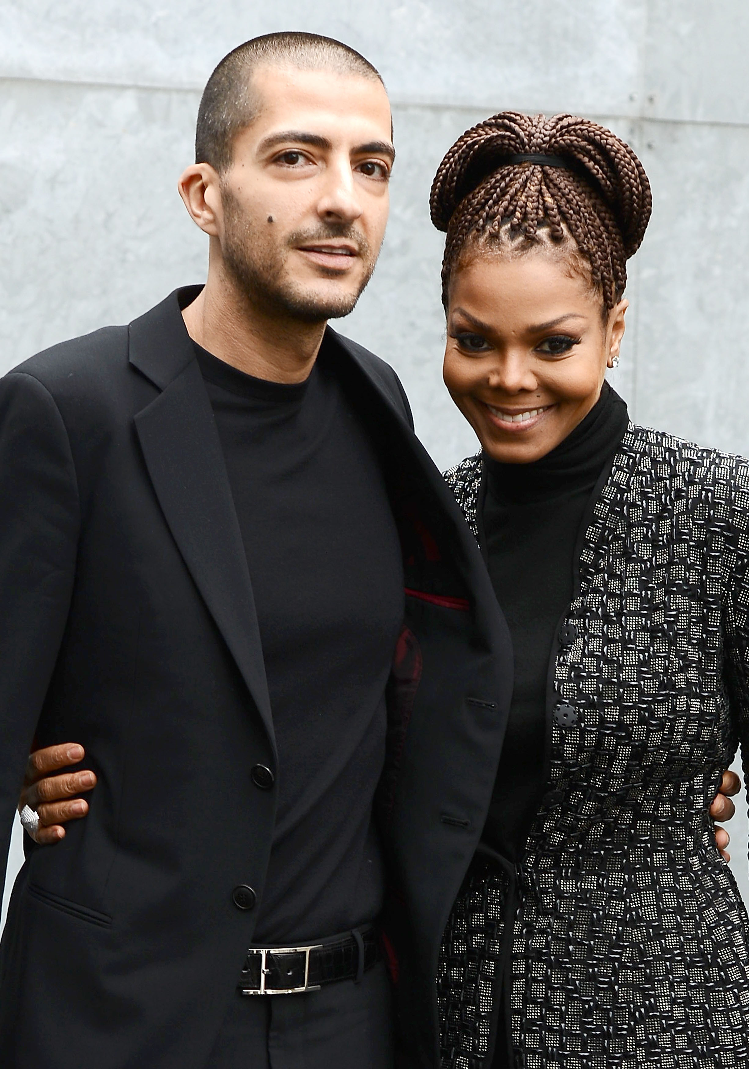 Wissam al Mana et Janet Jackson au défilé de mode Giorgio Armani lors de la Semaine de la mode féminine de Milan automne/hiver 2013/14, le 25 février 2013, à Milan, Italie | Source : Getty Images