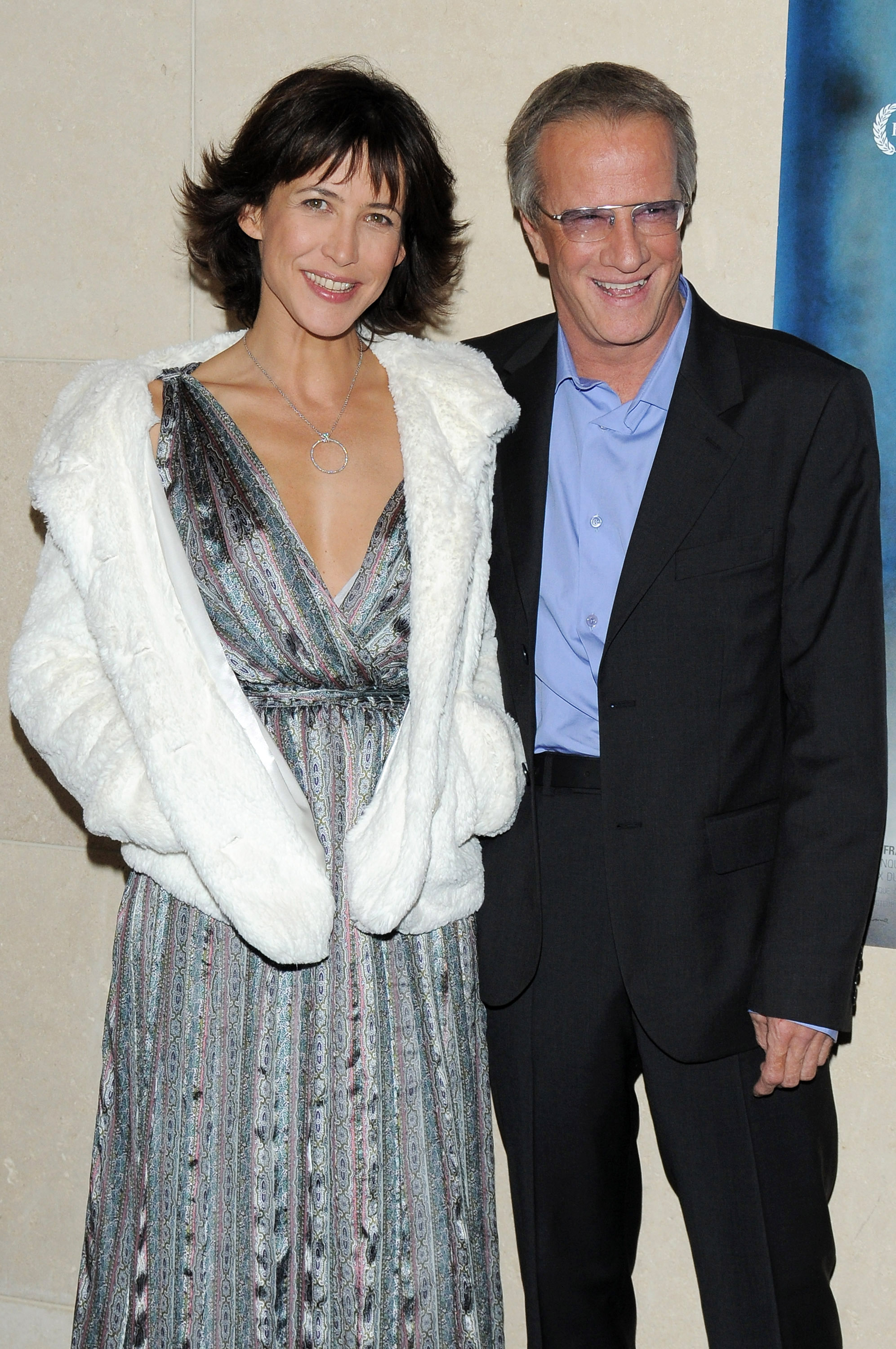L'actrice Sophie Marceau (à gauche) et son compagnon Christophe Lambert assistent à la première du film « L'Homme de chevet » à la Cinémathèque française, le 9 novembre 2009 à Paris, en France I Source : Getty Images