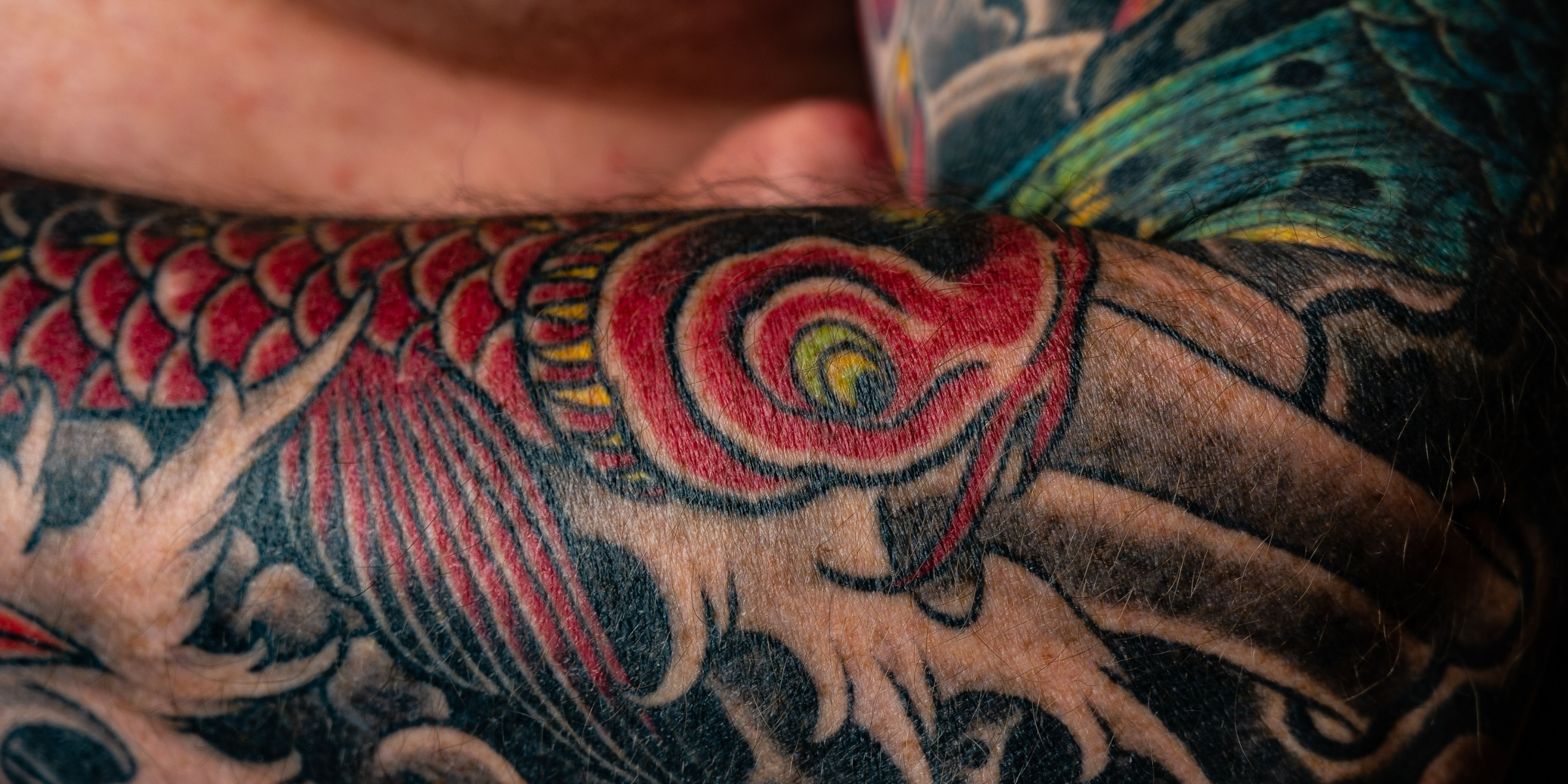 Tatouage sur tout le bras | Source : Pexels