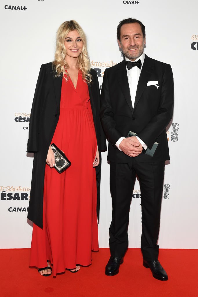 Gilles Lelouche et Alizée Guinochet arrivent aux César du cinéma 2018 à la salle Pleyel le 2 mars 2018 à Paris, France. | Photo : Getty Images