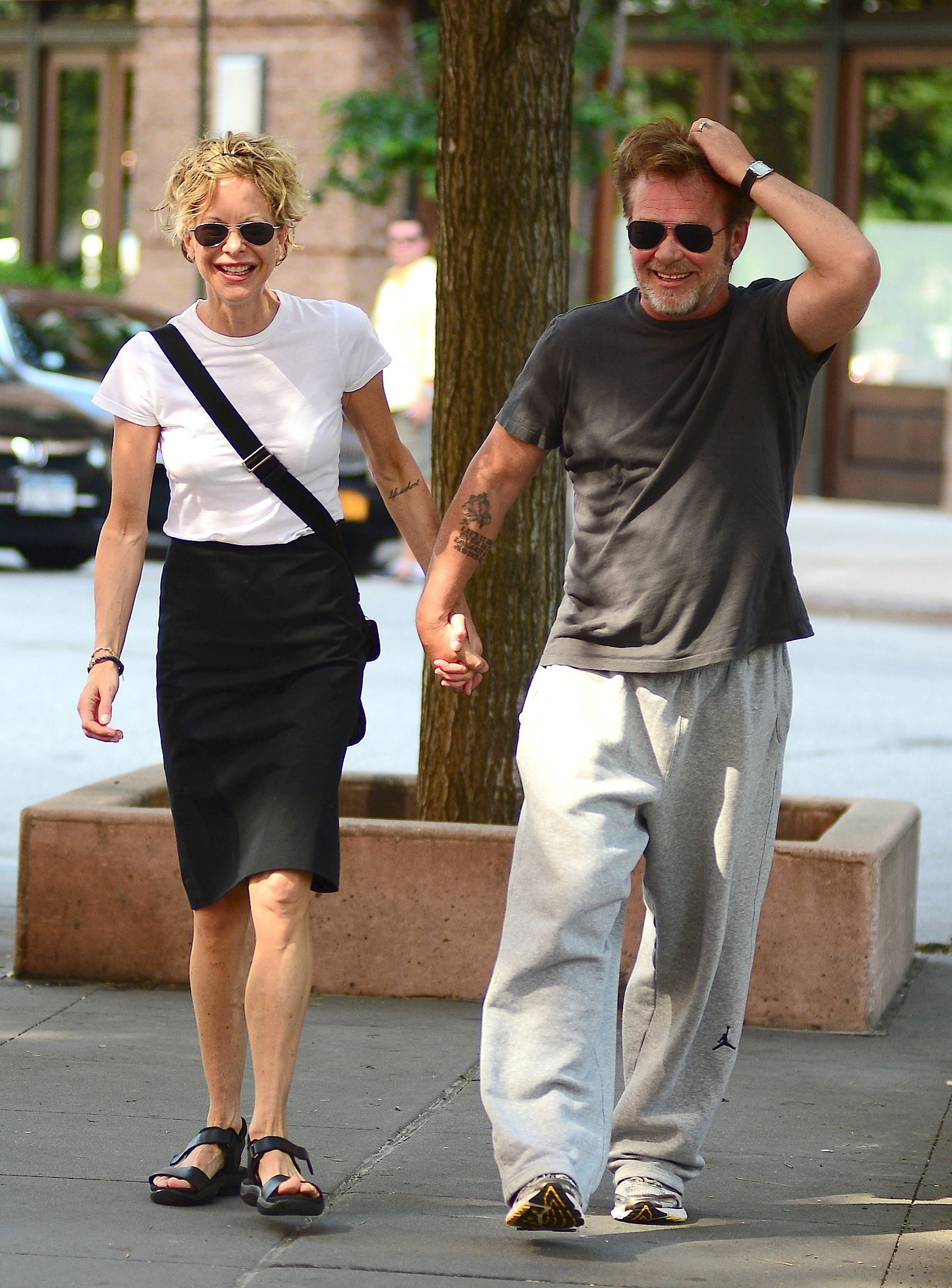 Meg Ryan et John Mellencamp sont vus à Tribeca le 24 juin 2013 à New York | Source : Getty Images
