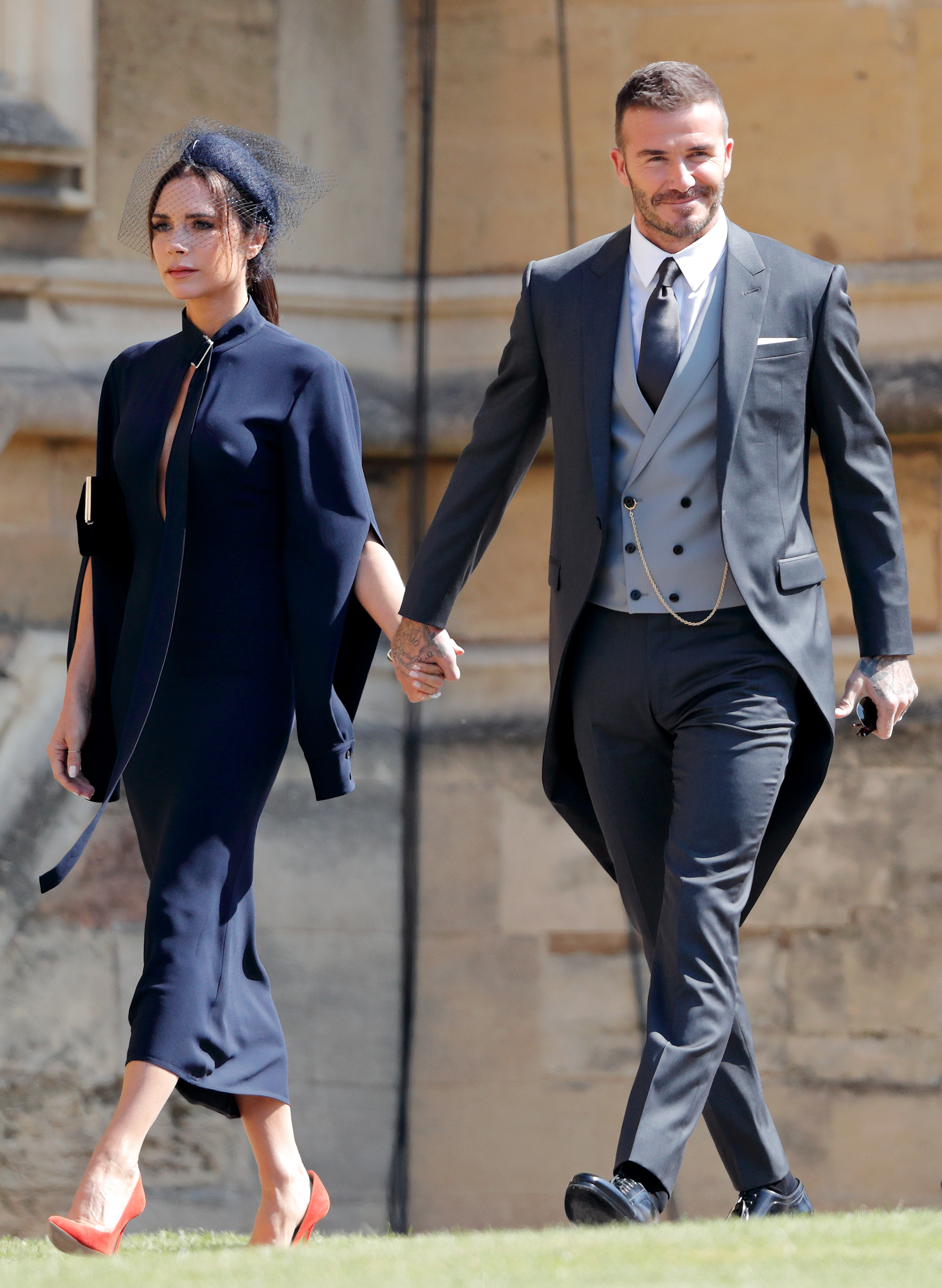 Victoria Beckham et David Beckham assistent au mariage du prince Harry et de Meghan Markle à la chapelle St George, au château de Windsor, le 19 mai 2018, à Windsor, en Angleterre. | Source : Getty Images