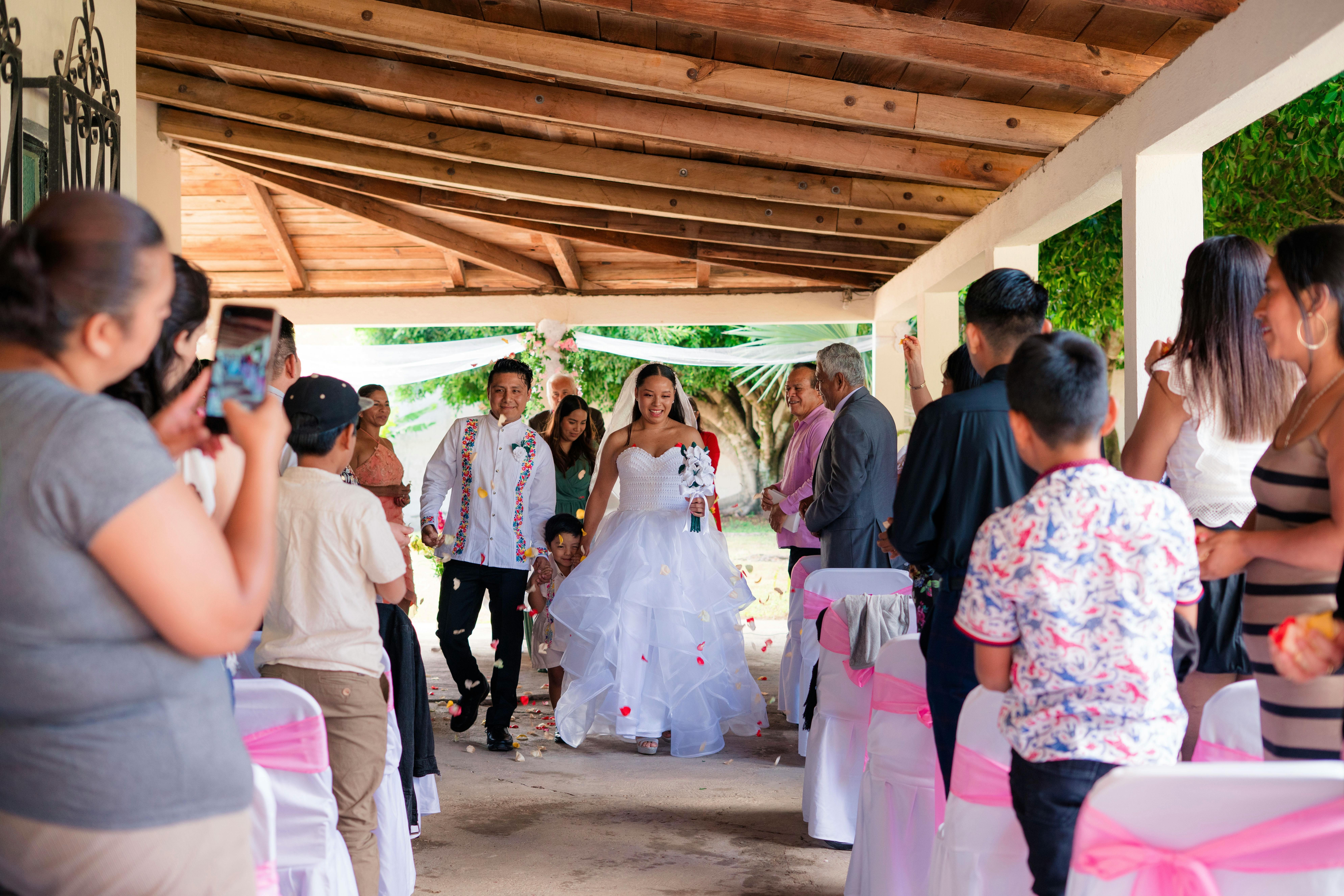 Une mariée et un marié heureux | Source : Pexels