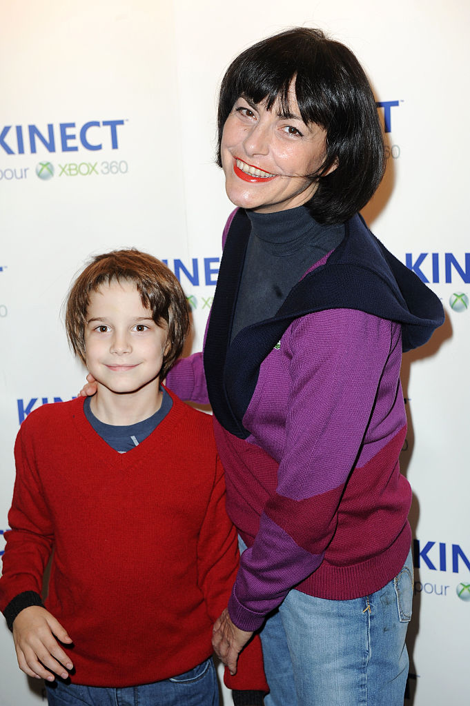 Lio et son fils Diego à la soirée de lancement de la Kinect au VIP Room à Paris. | Source : Getty Images