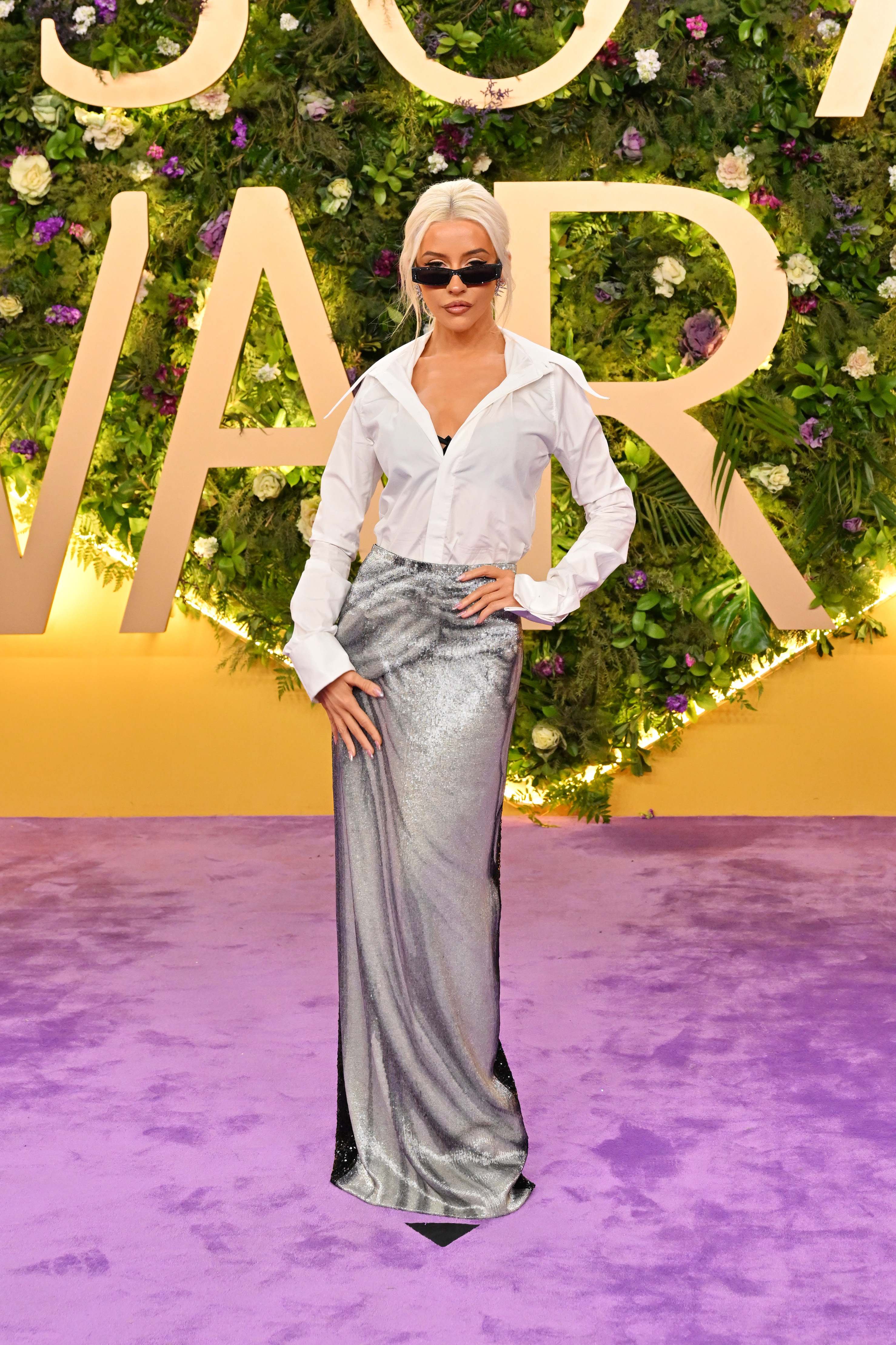 Christina Aguilera pose sur le tapis de l'événement. | Source : Getty Images