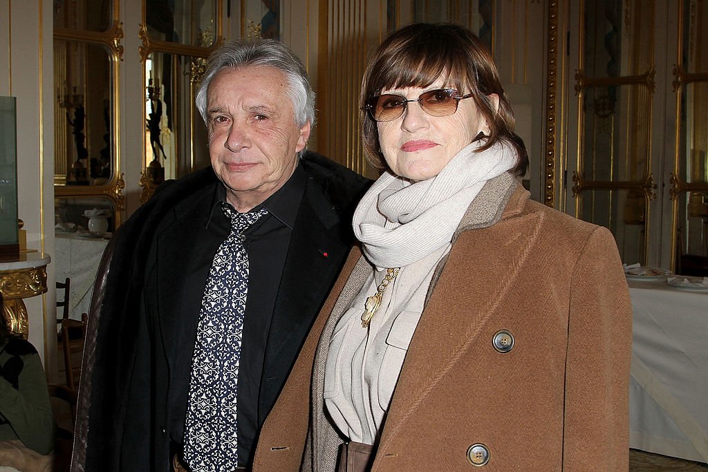 Michel Sardou et Anne-Marie Périer le 8 février 2012 à Paris. l Source : Getty Images