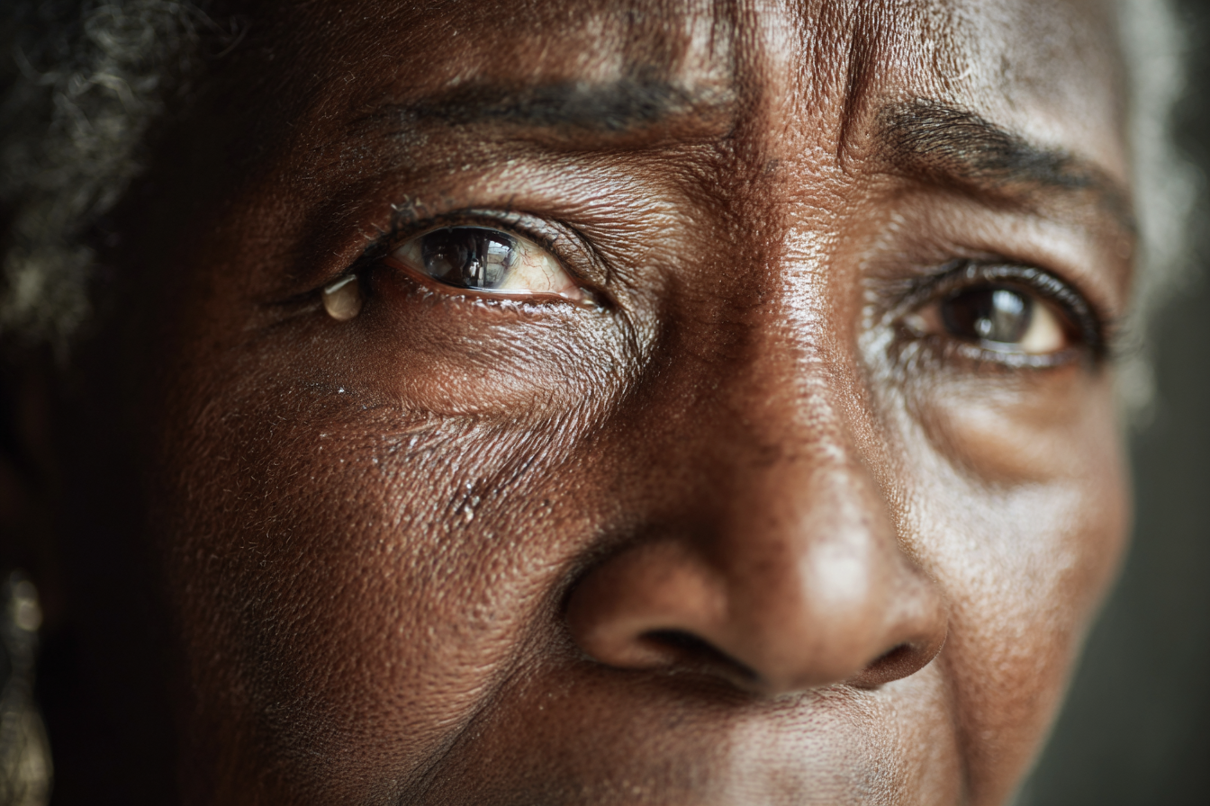 Une femme avec des larmes dans les yeux | Source : Midjourney