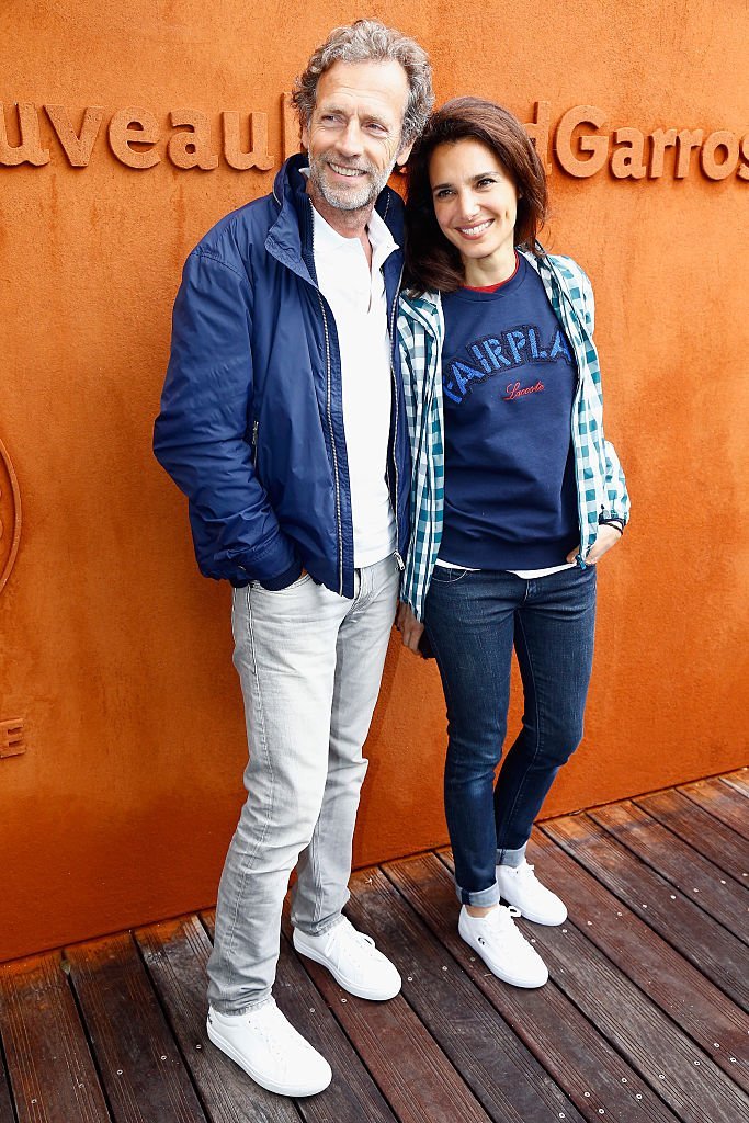 L'acteur Stéphane Freiss et son épouse Ursula assistent à l'Open de France de tennis à Roland Garros le 1er juin 2016 à Paris, France | Source : Getty Images.