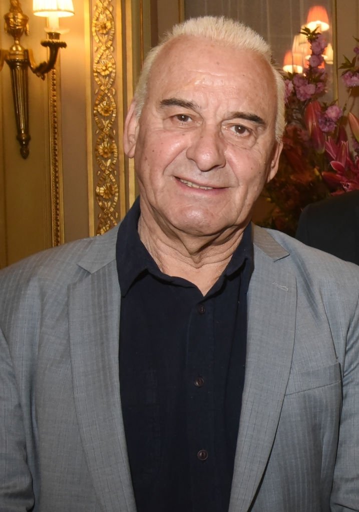Le chanteur Michel Fugain assiste au lancement du livre "Sardou Regards" de Bastien Kossek à l'Hôtel Raphael le 15 avril 2019 à Paris, France. | Photo : Getty Images