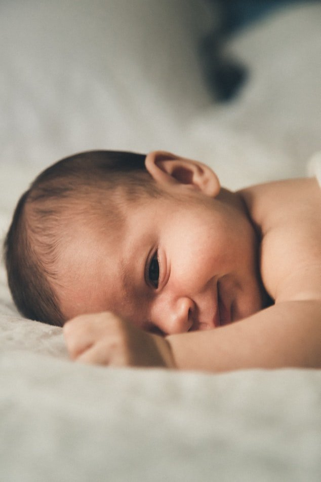 Un bébé souriant. l Source : Unsplash