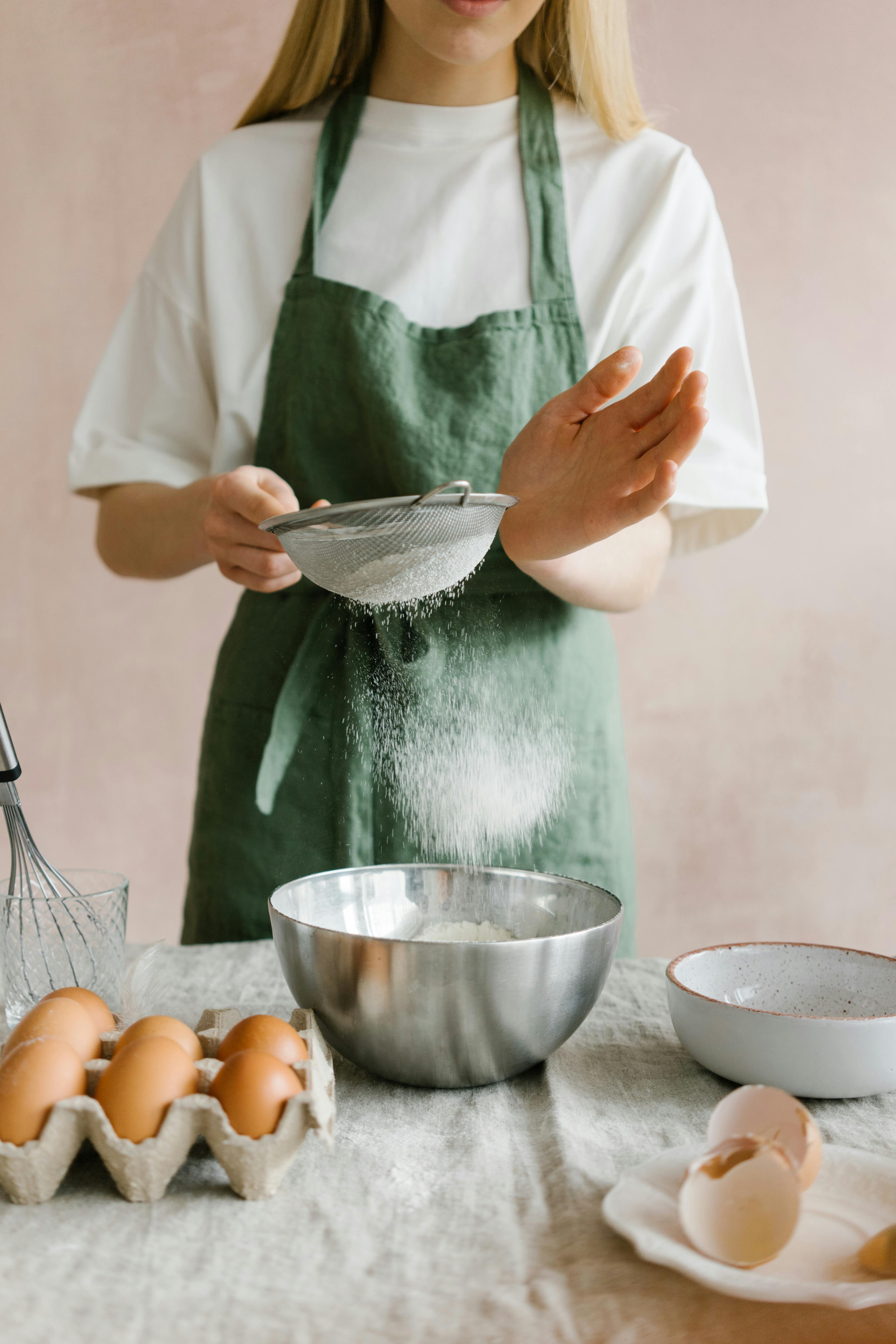 Eine Frau beim Kochen | Quelle: Pexels