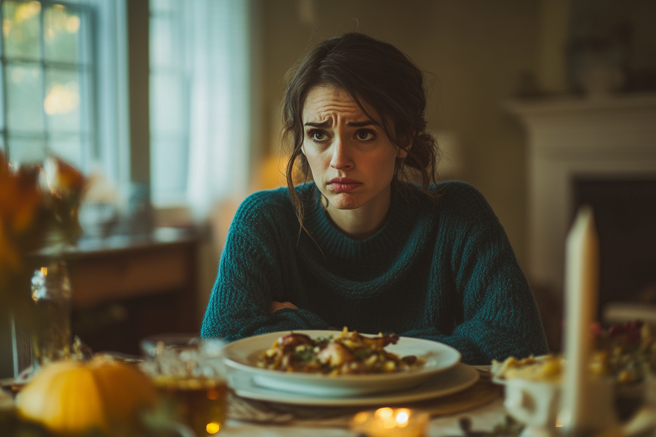 Une femme à l'air triste pendant le repas de Thanksgiving | Source : Midjourney