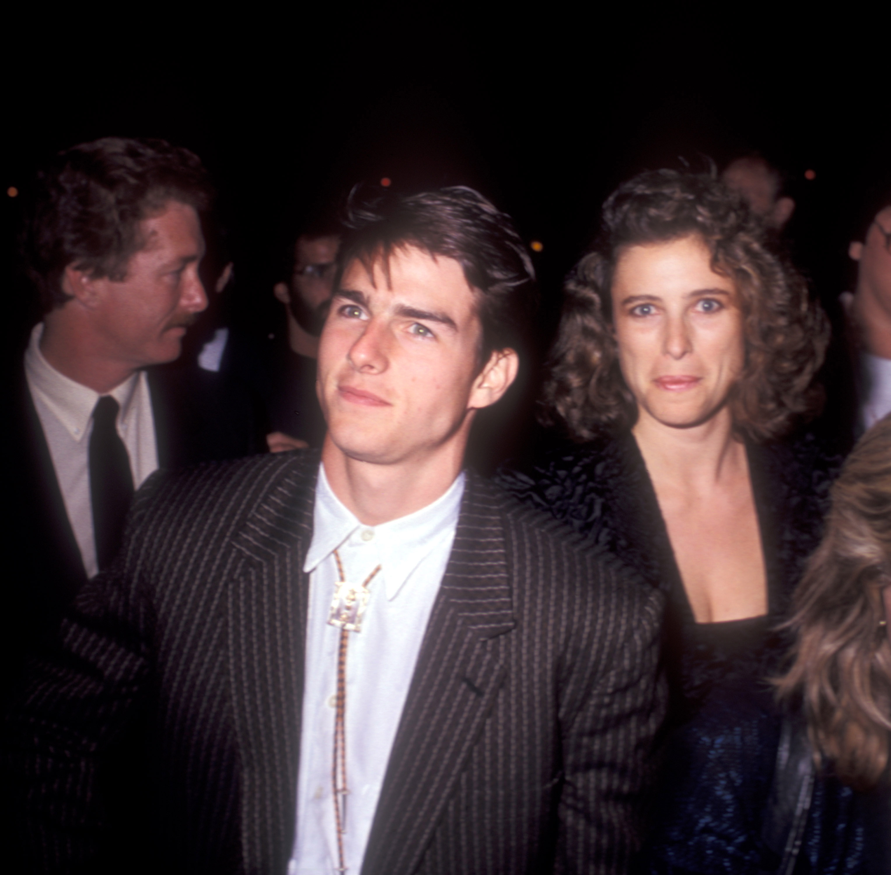 Tom Cruise et Mimi Rogers lors de la première de "La couleur de l'argent" à Los Angeles, Californie, le 14 octobre 1986. | Source : Getty Images