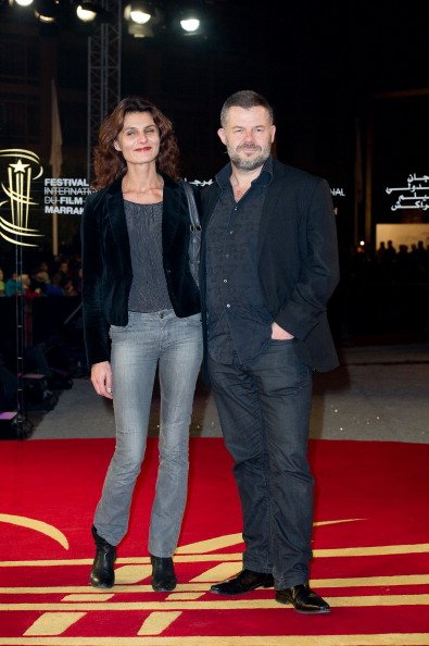 Eric Naulleau et sa femme arrivent au 'Photocall Red Carpet' pendant le Festival International du Film de Marrakech 2011 à Marrakech, Maroc. | Photo : Getty Images