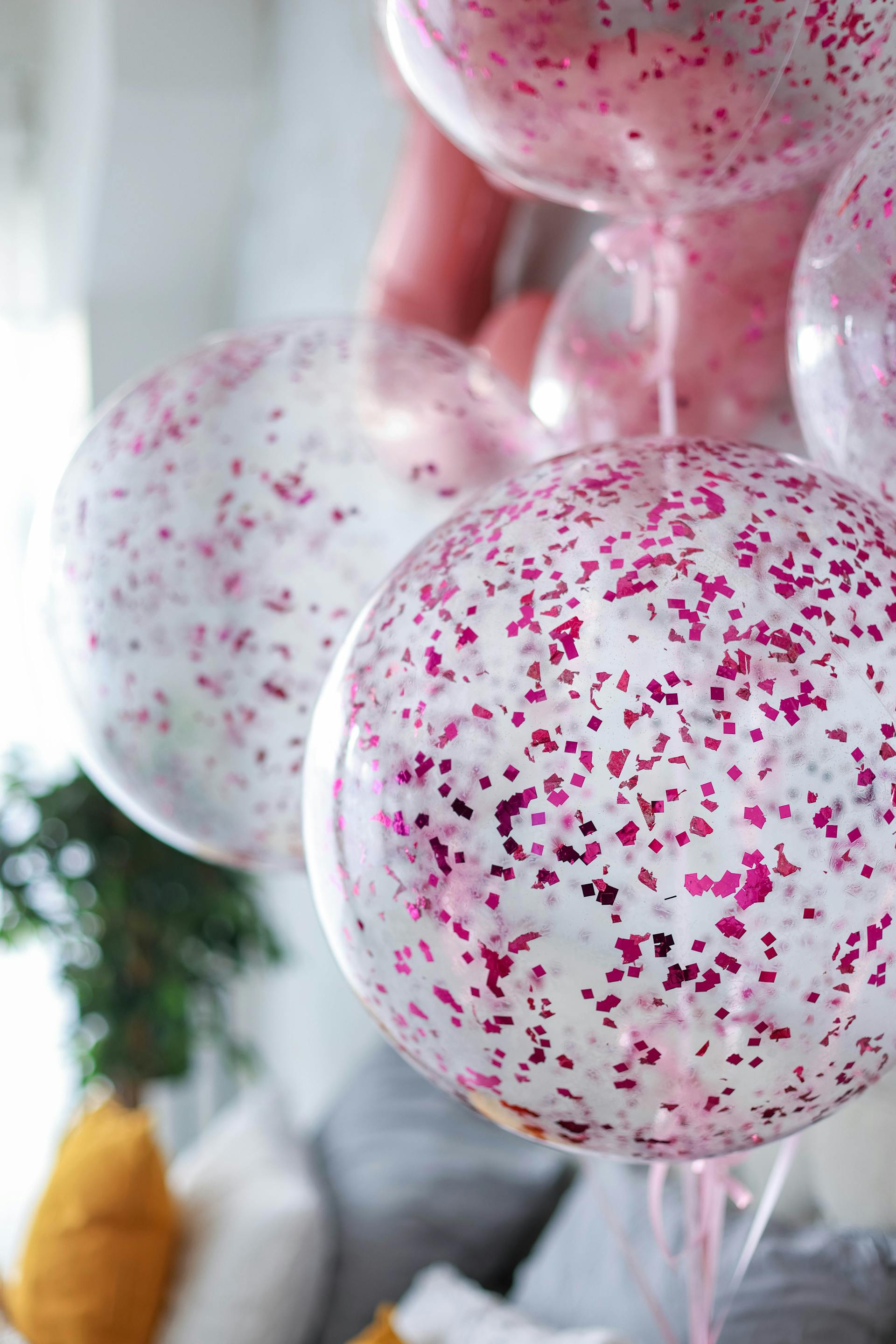 Ballons de baudruche à paillettes roses | Source : Pexels