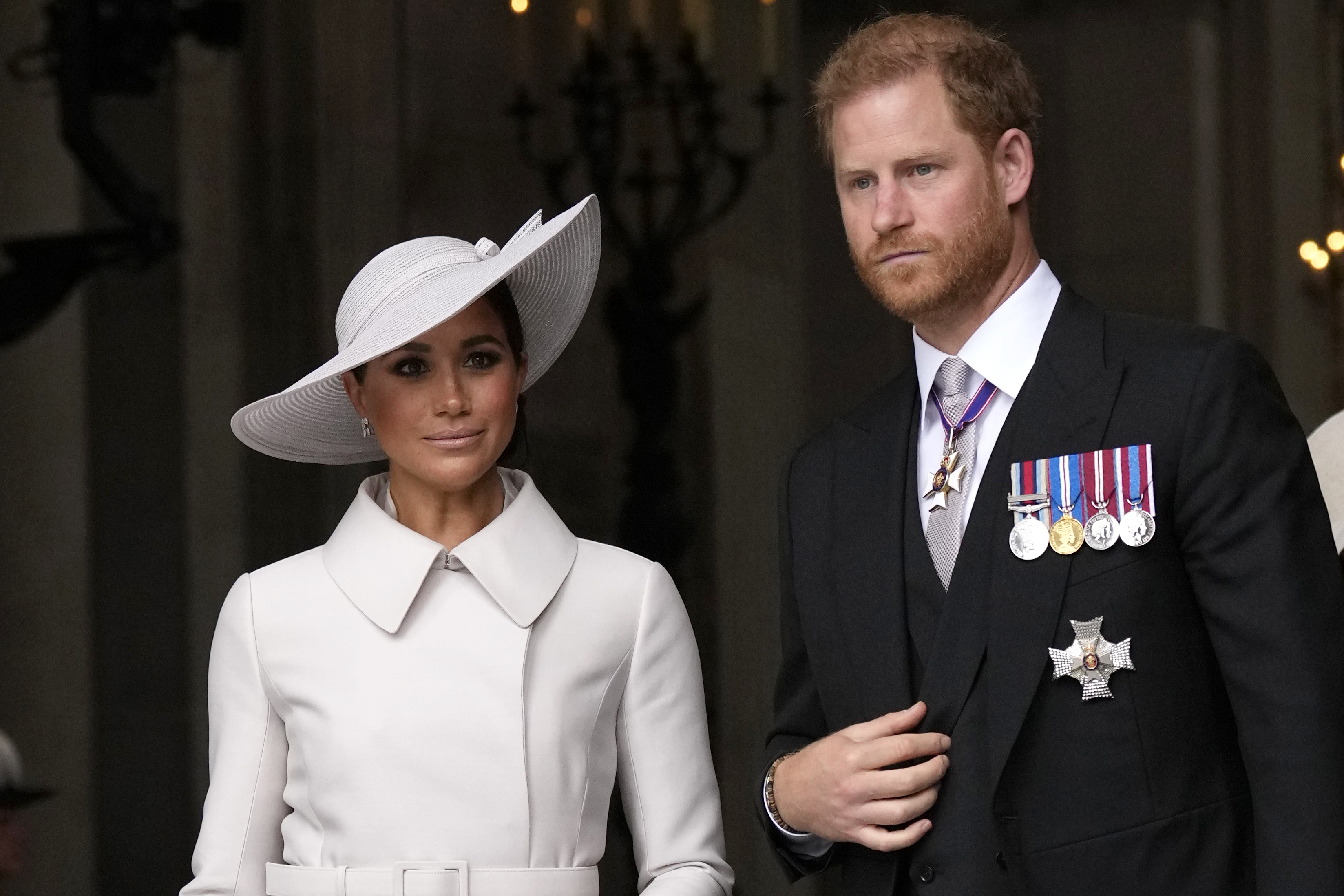 Le prince Harry et Meghan Markle partent après un service d'action de grâce pour la défunte reine Élisabeth II à la cathédrale Saint-Paul, le 3 juin 2022, à Londres. | Source : Getty Images