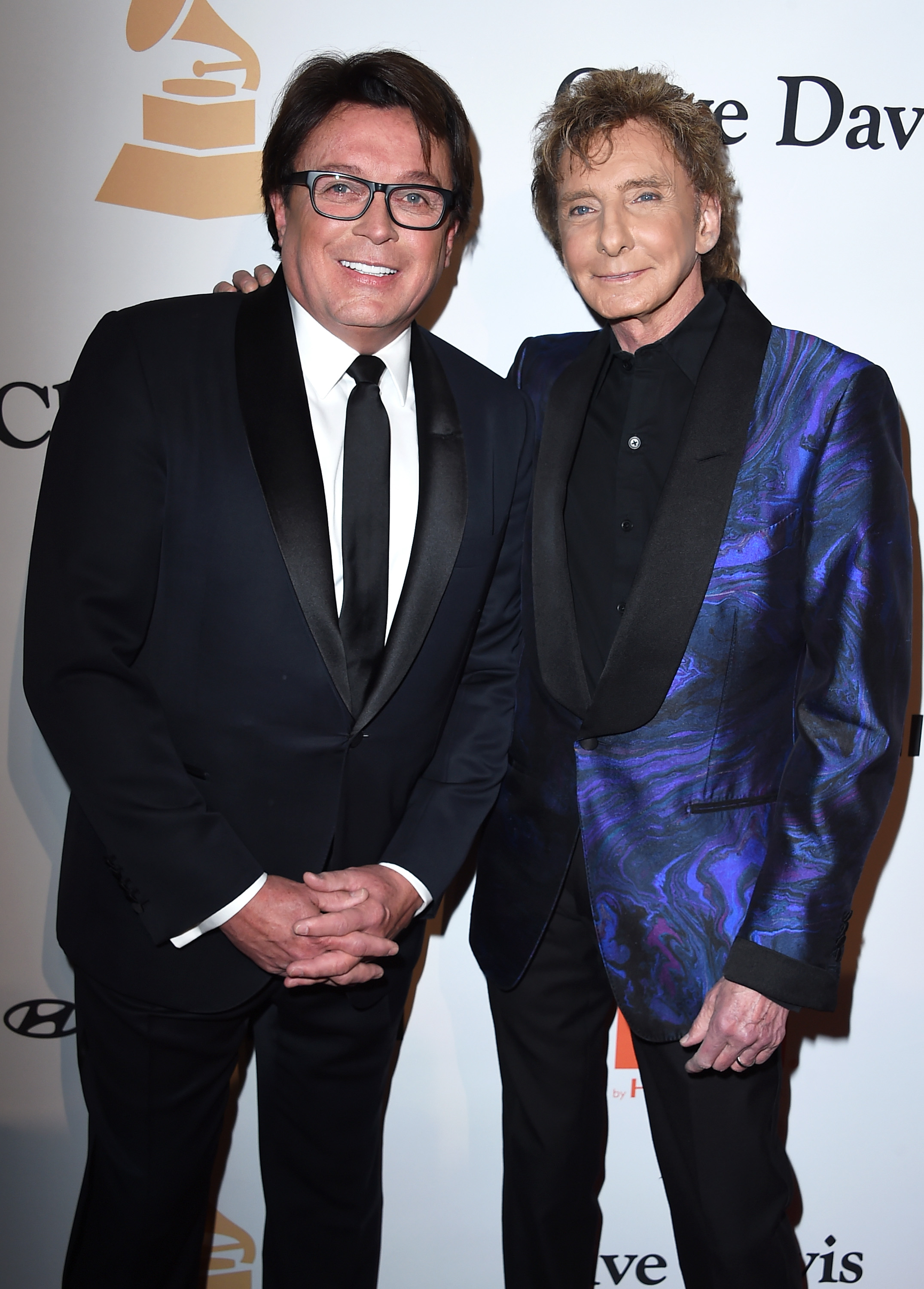 Garry Kief et Barry Manilow lors du gala pré-Grammy à Beverly Hills, en Californie, le 14 février 2016 | Source : Getty Images