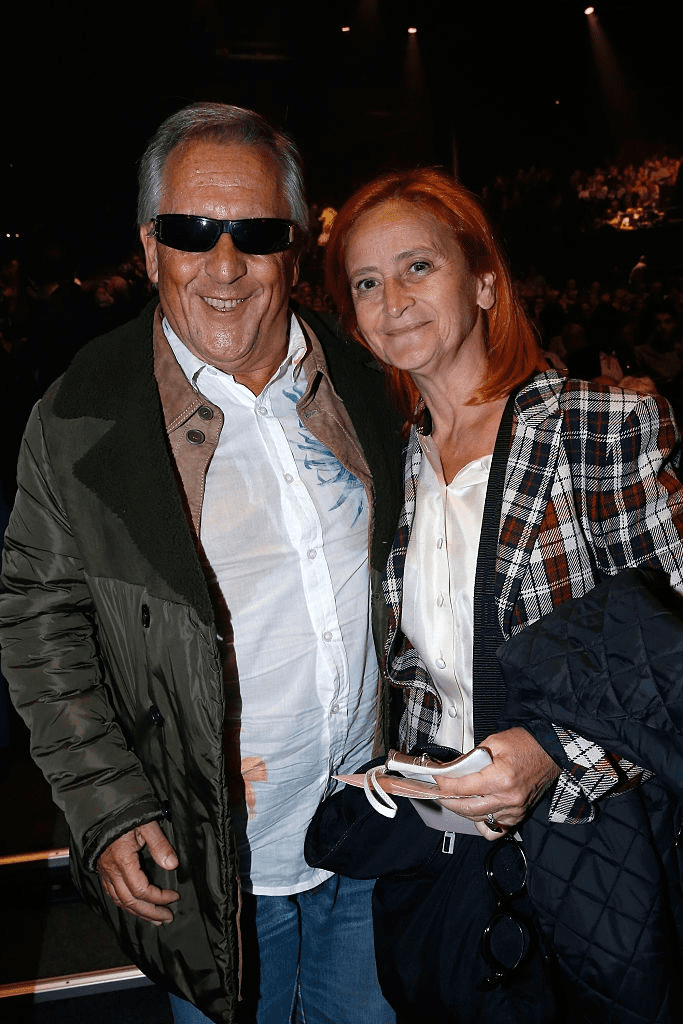 Le chanteur Gilbert Montagné et son épouse Nikole assistent au concert du chanteur Charles Aznavour au Palais des Sports le 15 septembre 2015 à Paris, France. | Photo : Getty Images