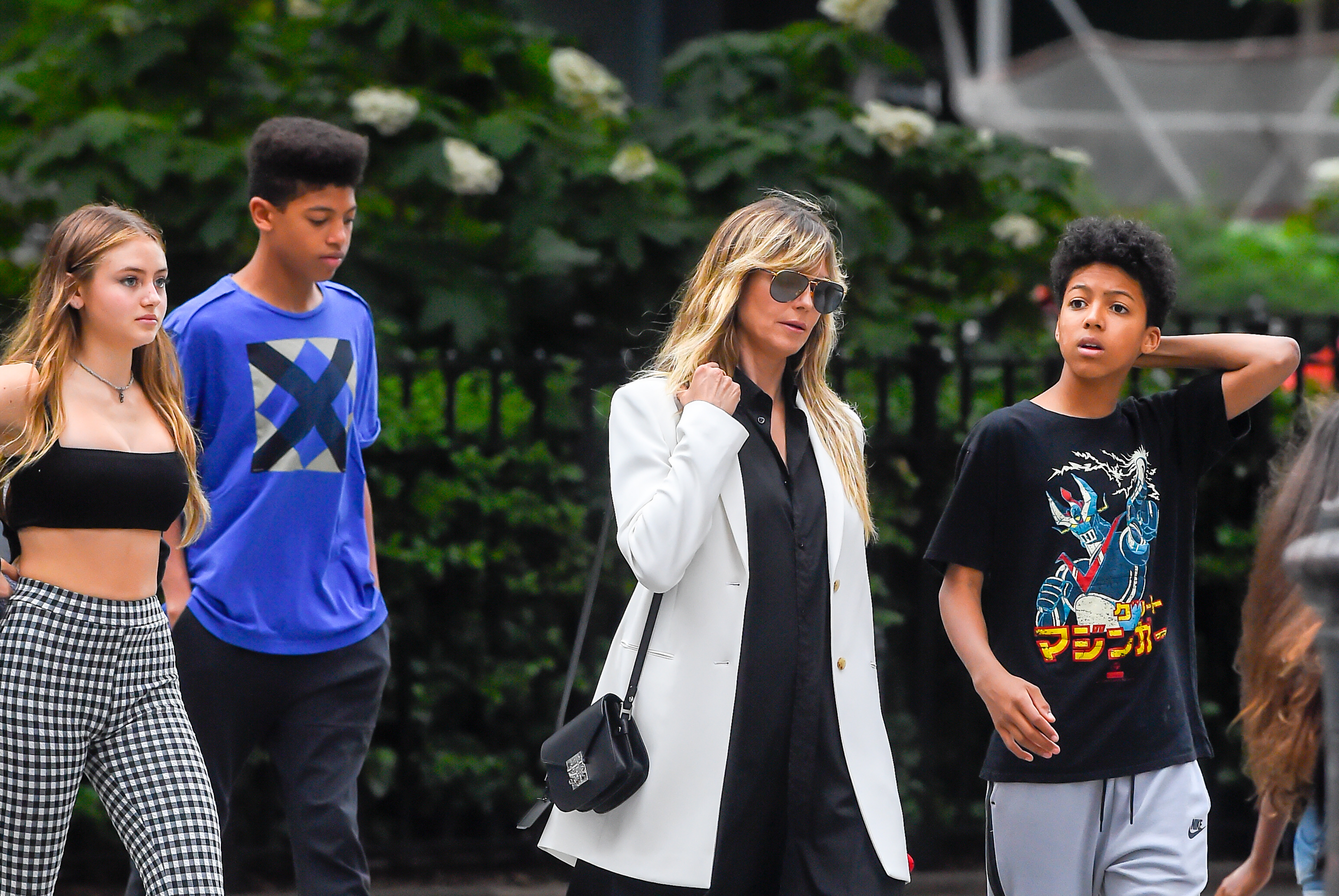 Heidi Klum, Johan et Henry Samuel, et une quatrième personne vus le 19 juin 2019, à New York | Source : Getty Images