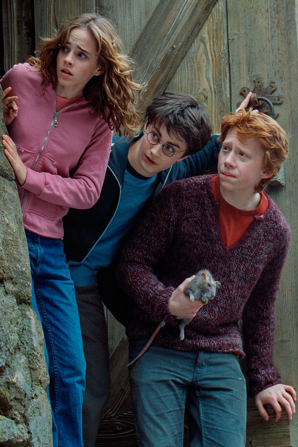 Emma Watson, Daniel Radcliffe et Rupert Grint sur le tournage de "Harry Potter et le Prisonnier d'Azkaban", à Londres, en Angleterre, en 2003 | Source : Getty Images